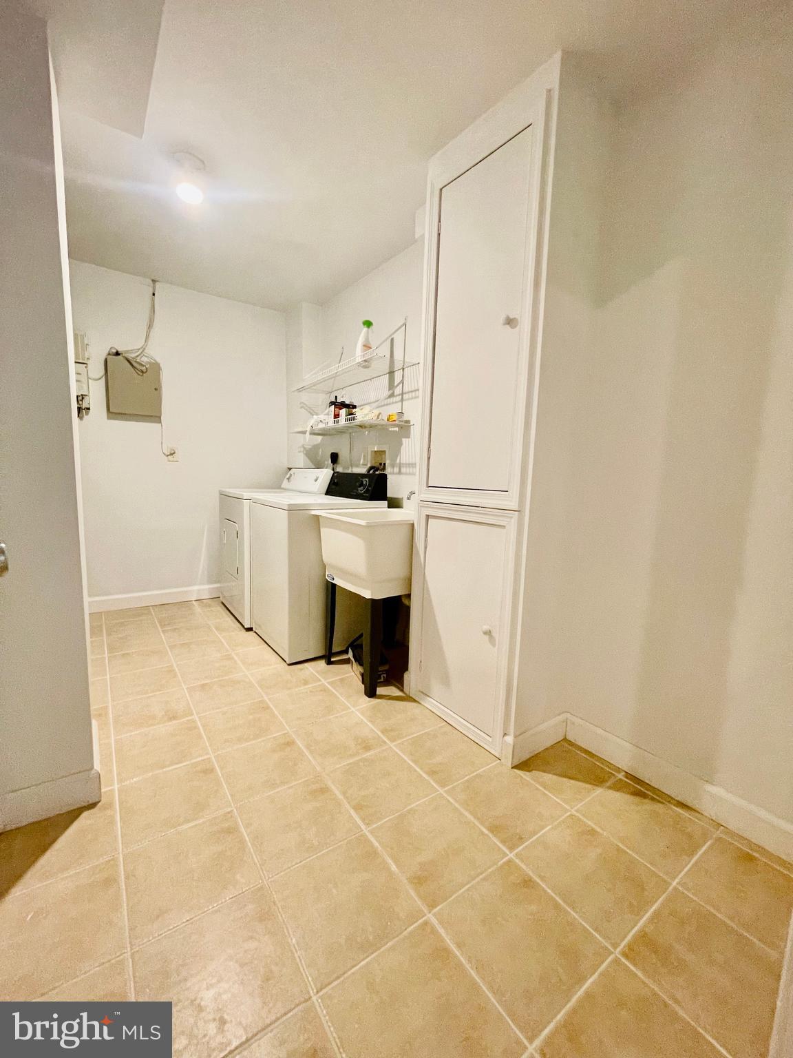 7204 Calm Sunset Columbia, MD 21046 - Photo 47 of 51 Basement Laundry Room