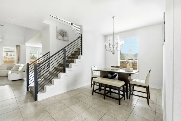 a view of entryway and hall with dining room