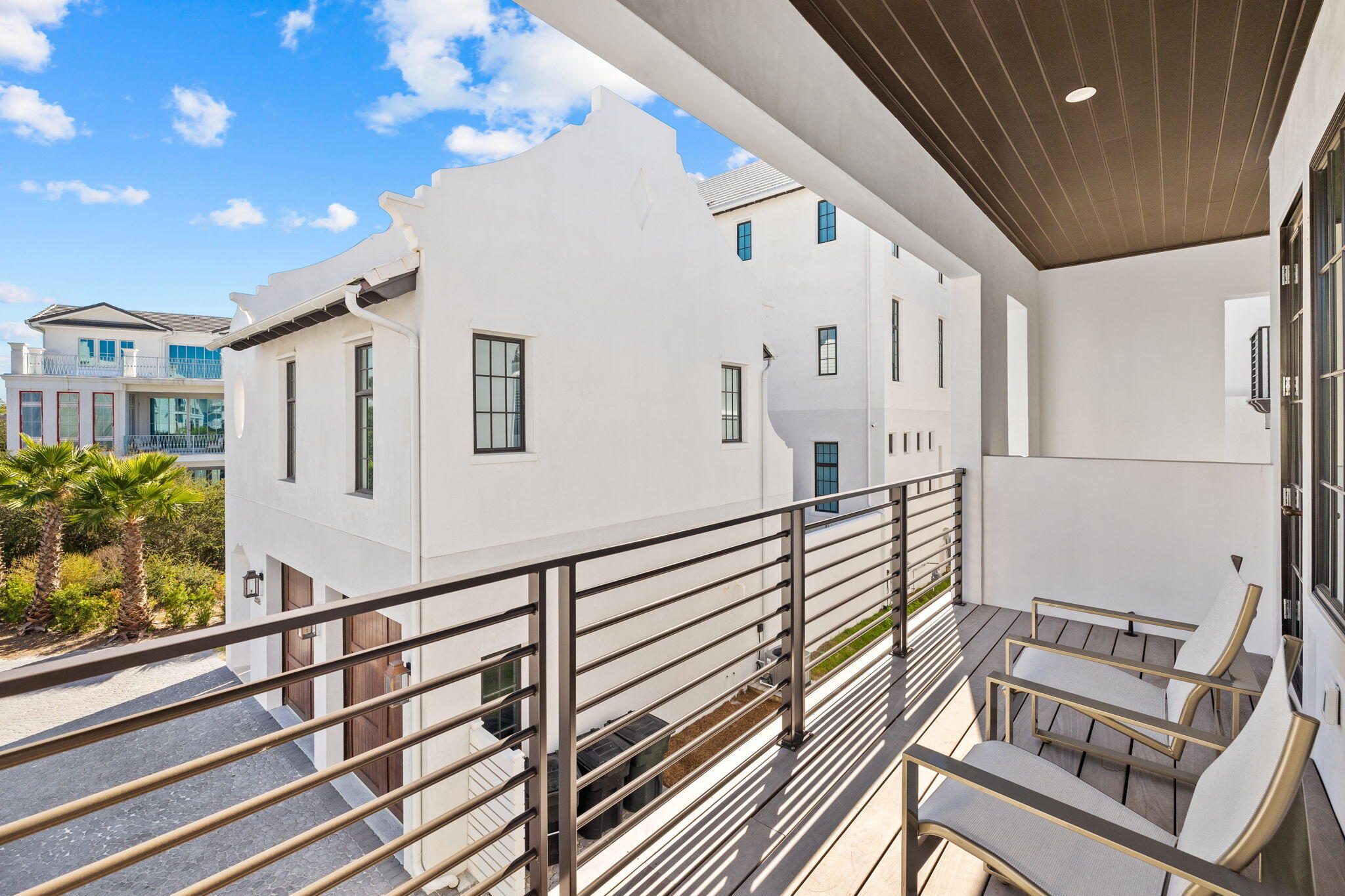 3504 East County Highway 30A Santa Rosa Beach, FL 32459 - Photo 117 of 137 a view of a balcony with lots of green space and glass windows