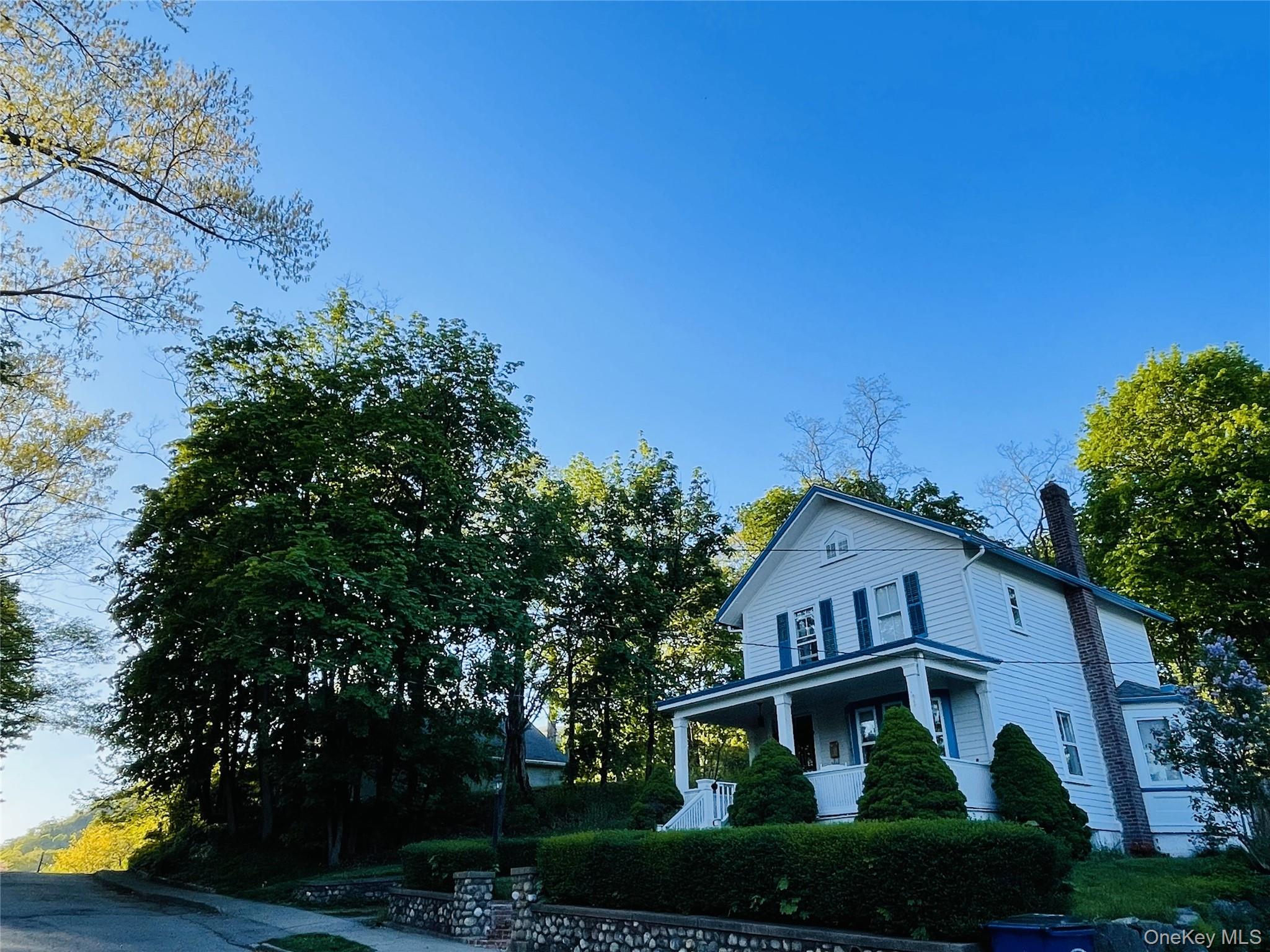 12 Parrott Street Cold Spring, NY 10516 - Photo 17 of 18 View of front of property featuring covered porch and charming stone wall