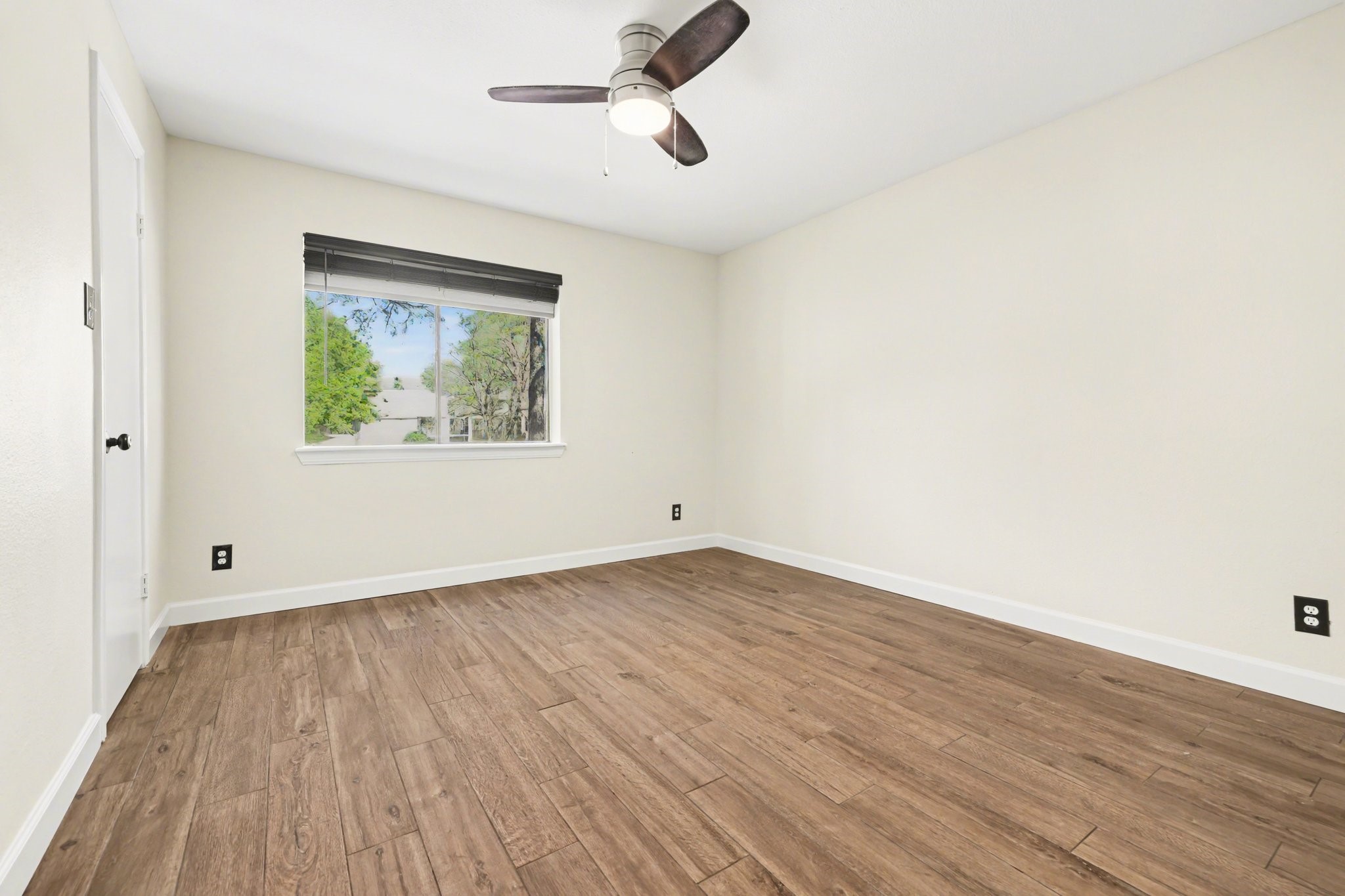 3500 Tangle Brush Drive, Unit 83 Spring, TX 77381 - Photo 13 of 17 View of the primary bedroom with a huge window and a walk-in closet.