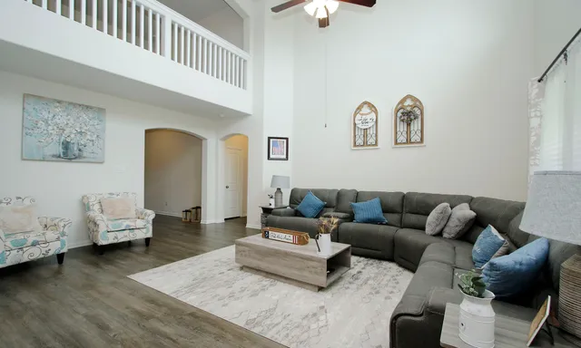 a living room with furniture and a couch
