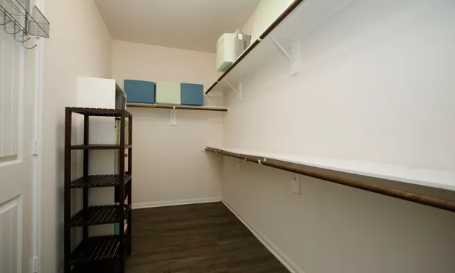 a white bath tub sitting next to a window