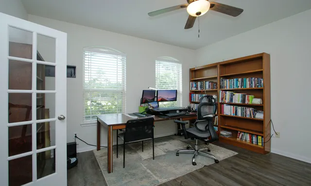a workspace with a bookshelf