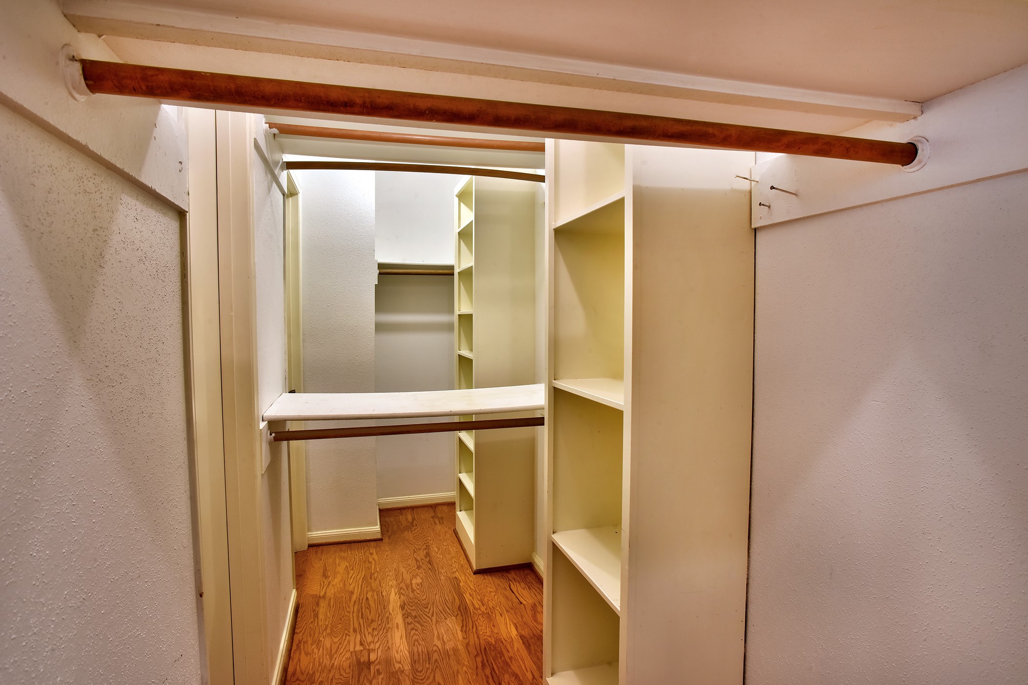 7441 Brompton Street Houston, TX 77025 - Photo 17 of 21 a bathroom with a glass shower door