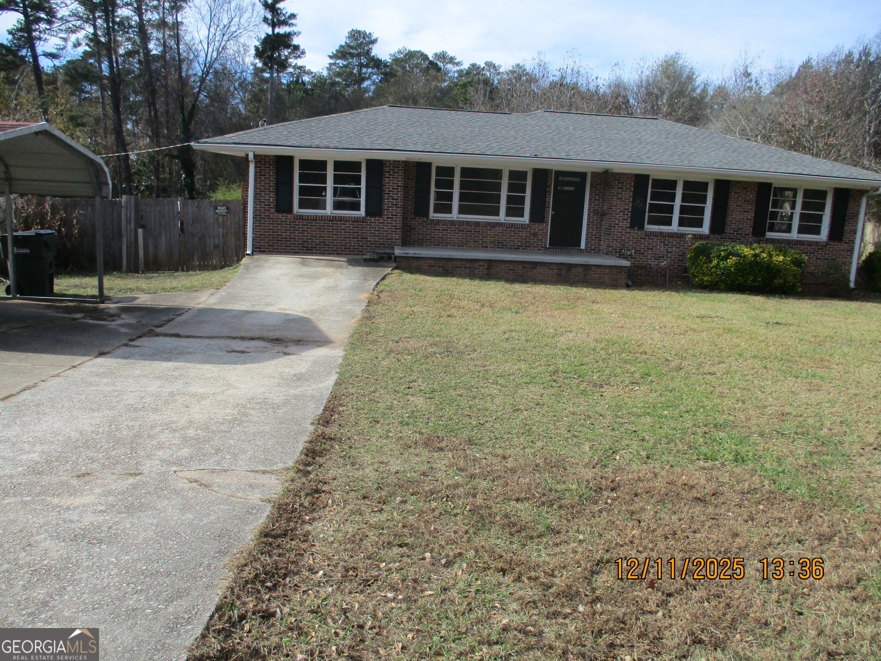 9182 Flat Shoals Road Southwest, Unit STREET Covington, GA 30014 - Photo 1 of 13 front view of a house with a yard