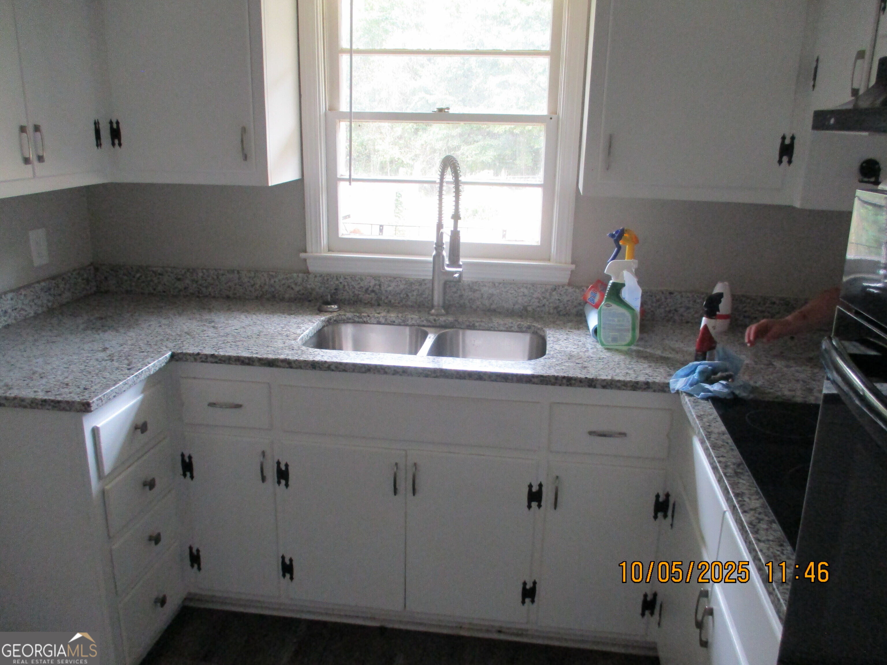 9182 Flat Shoals Road Southwest, Unit STREET Covington, GA 30014 - Photo 3 of 13 a close view of sink and tap