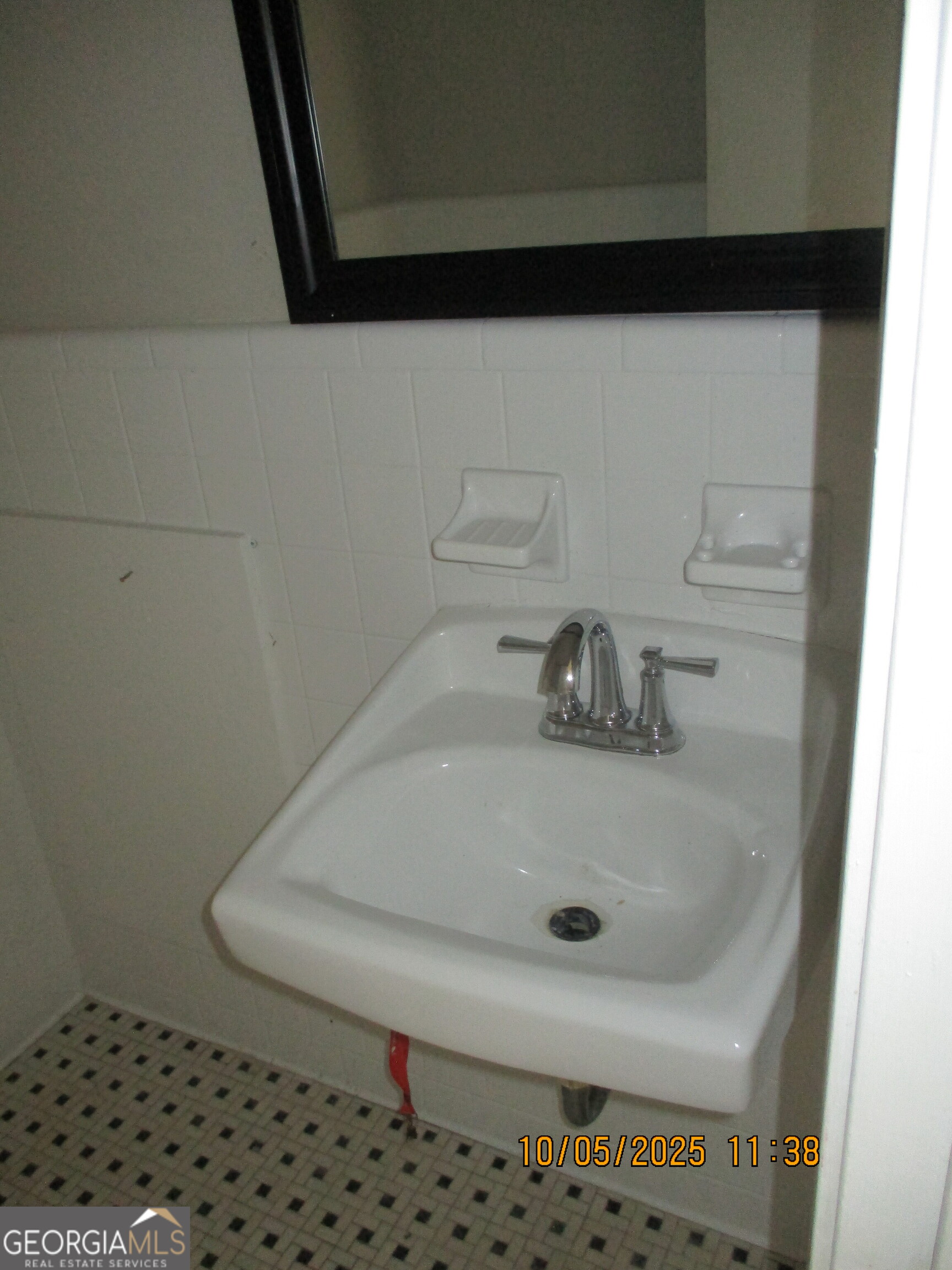 9182 Flat Shoals Road Southwest, Unit STREET Covington, GA 30014 - Photo 9 of 13 a bathroom with a sink