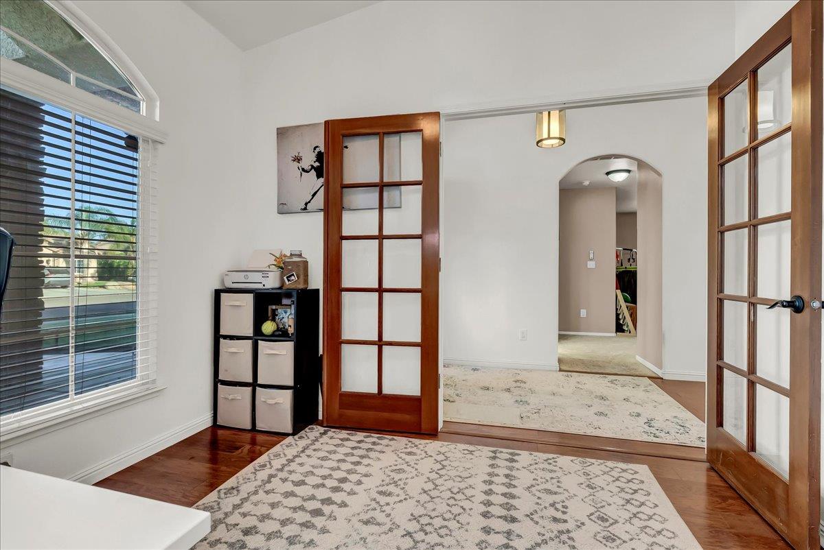 695 Crescent Lane Lemoore, CA 93245 - Photo 15 of 51 a bedroom with a bed and a window