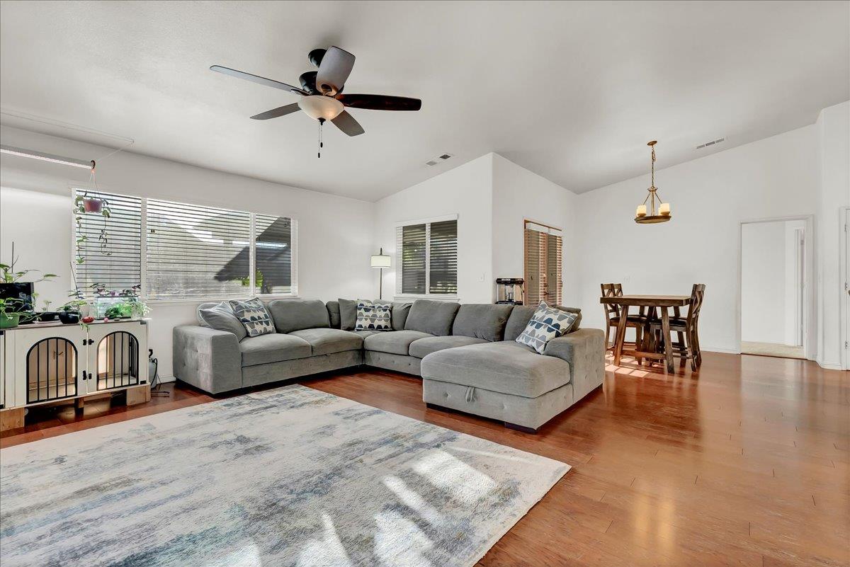 695 Crescent Lane Lemoore, CA 93245 - Photo 18 of 51 a living room with furniture and a large window