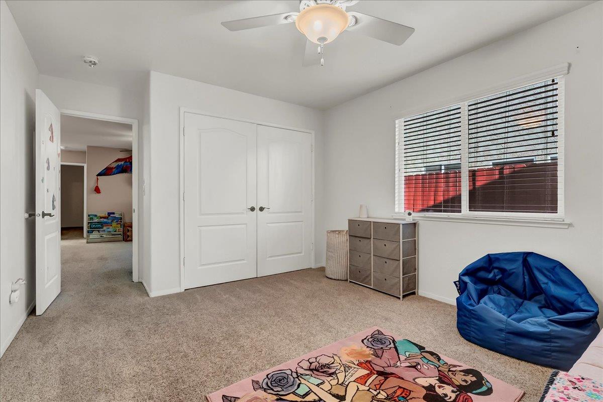 695 Crescent Lane Lemoore, CA 93245 - Photo 35 of 51 a living room with furniture and a window