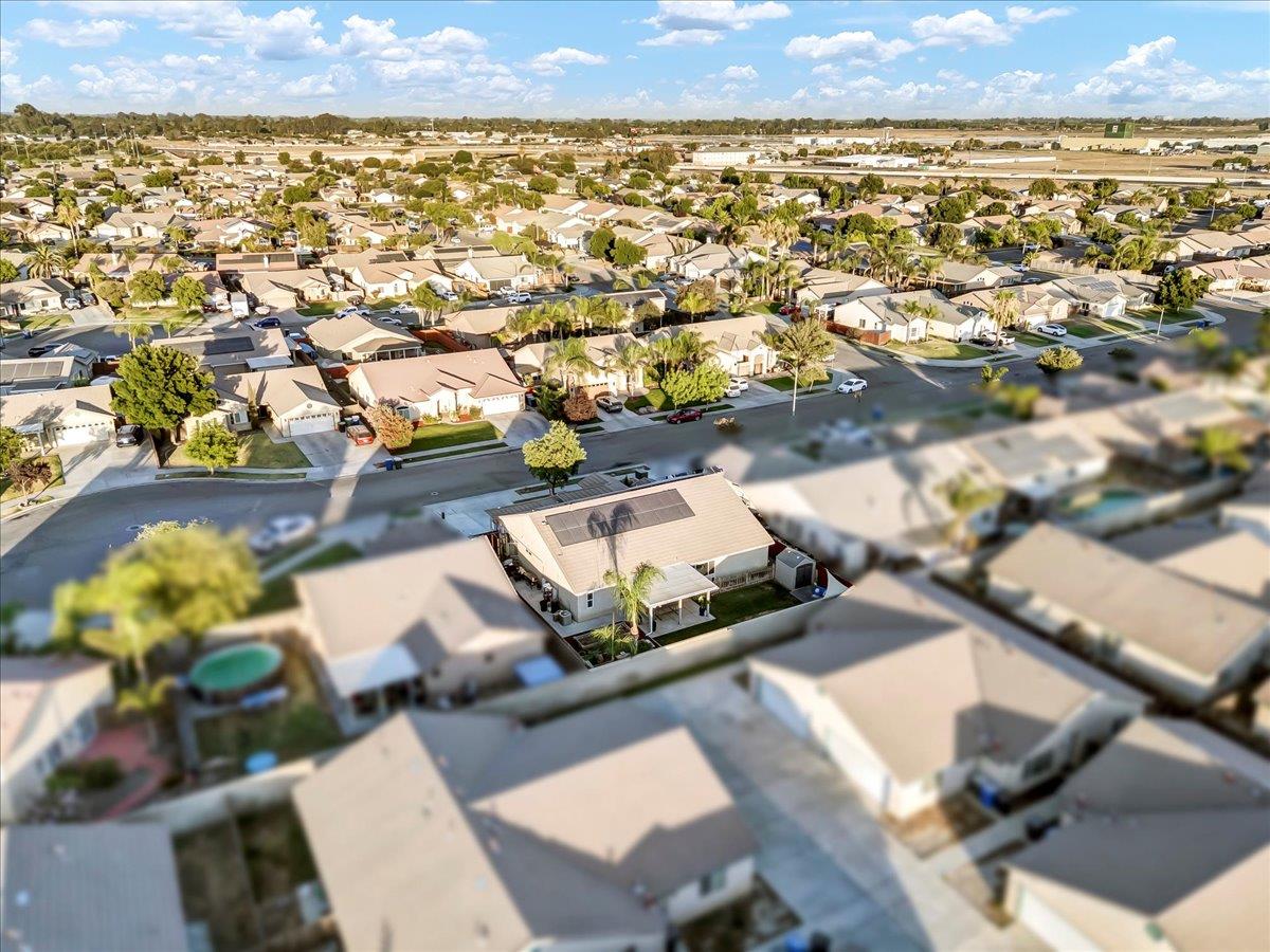 695 Crescent Lane Lemoore, CA 93245 - Photo 48 of 51 an aerial view of a residential houses with outdoor space