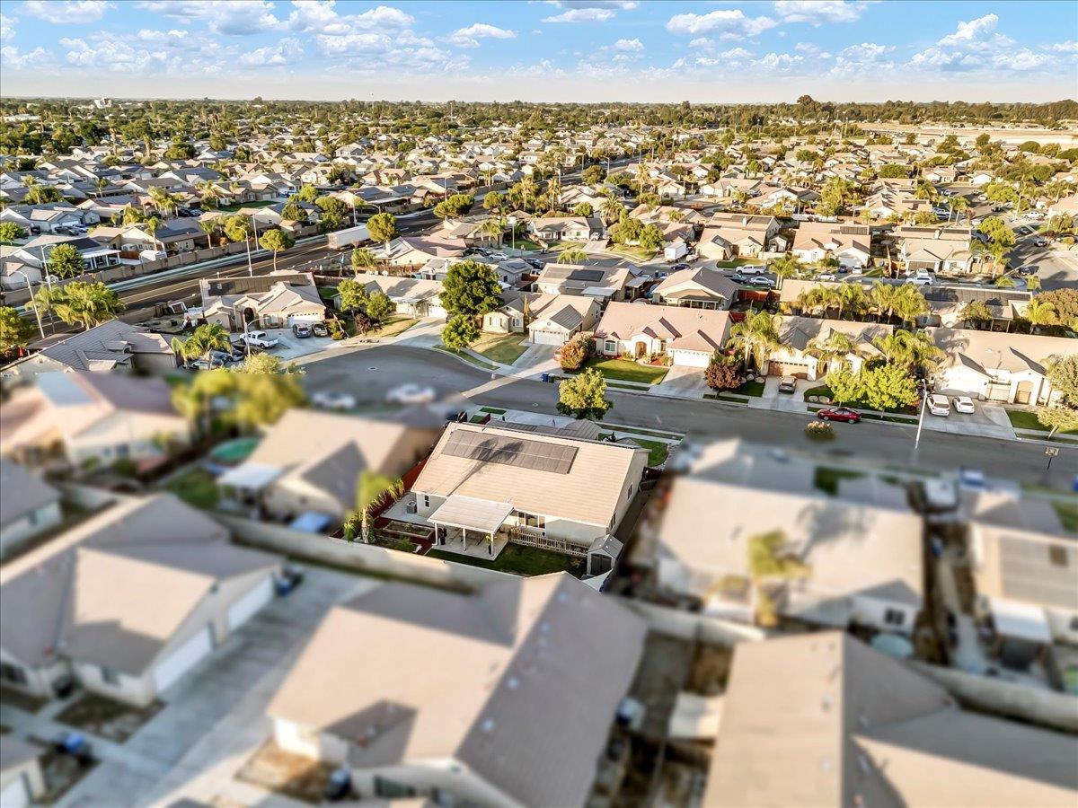 695 Crescent Lane Lemoore, CA 93245 - Photo 49 of 51 an aerial view of a residential houses with city view