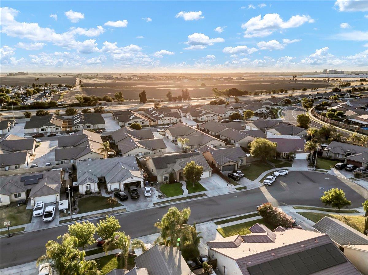 695 Crescent Lane Lemoore, CA 93245 - Photo 8 of 51 an aerial view of a city