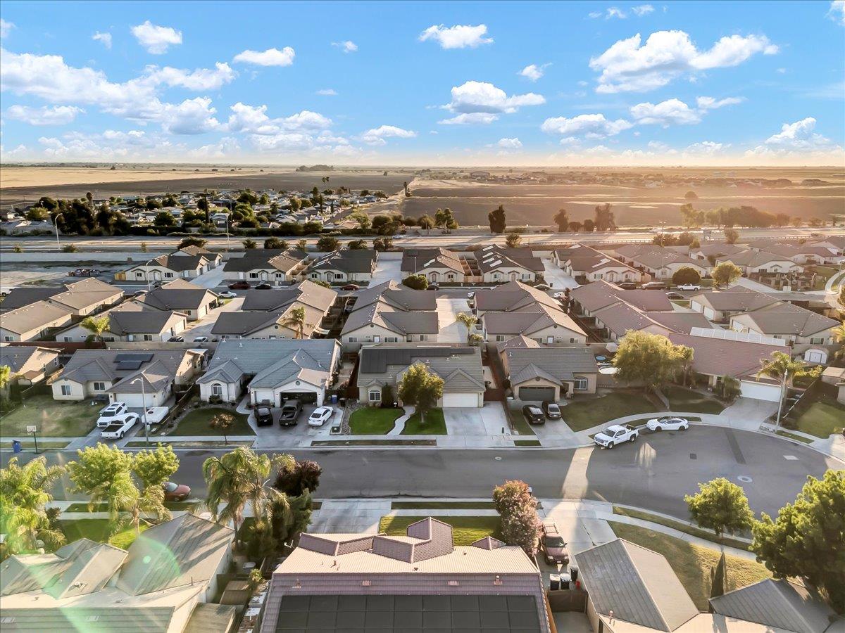695 Crescent Lane Lemoore, CA 93245 - Photo 9 of 51 an aerial view of a city
