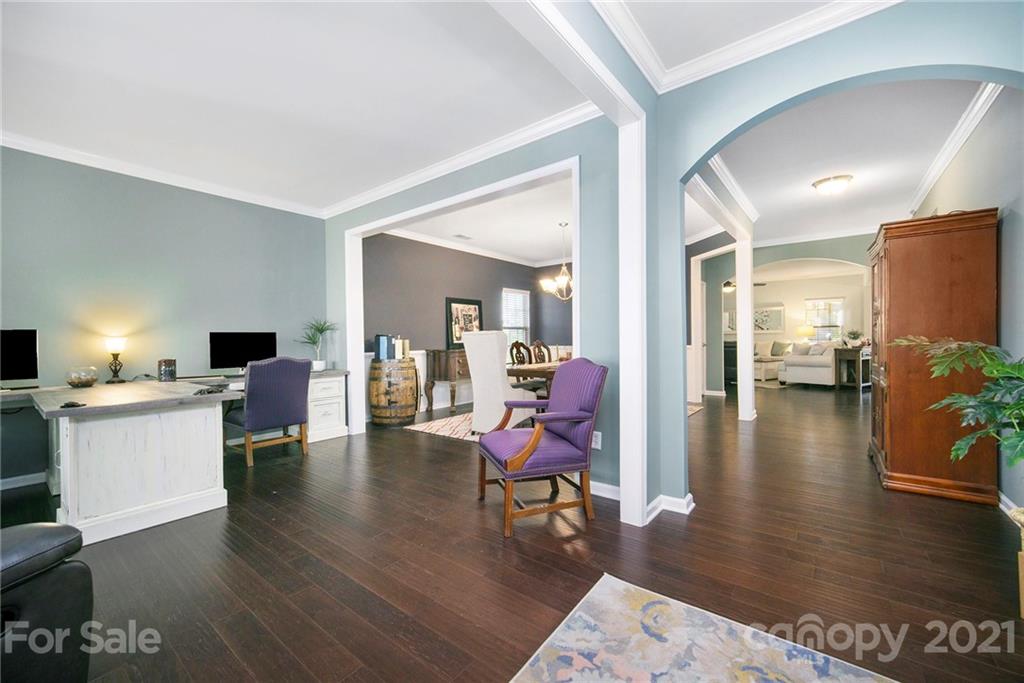 2159 Stone Pile Drive Concord, NC 28025 - Photo 16 of 33 a living room with furniture and a table