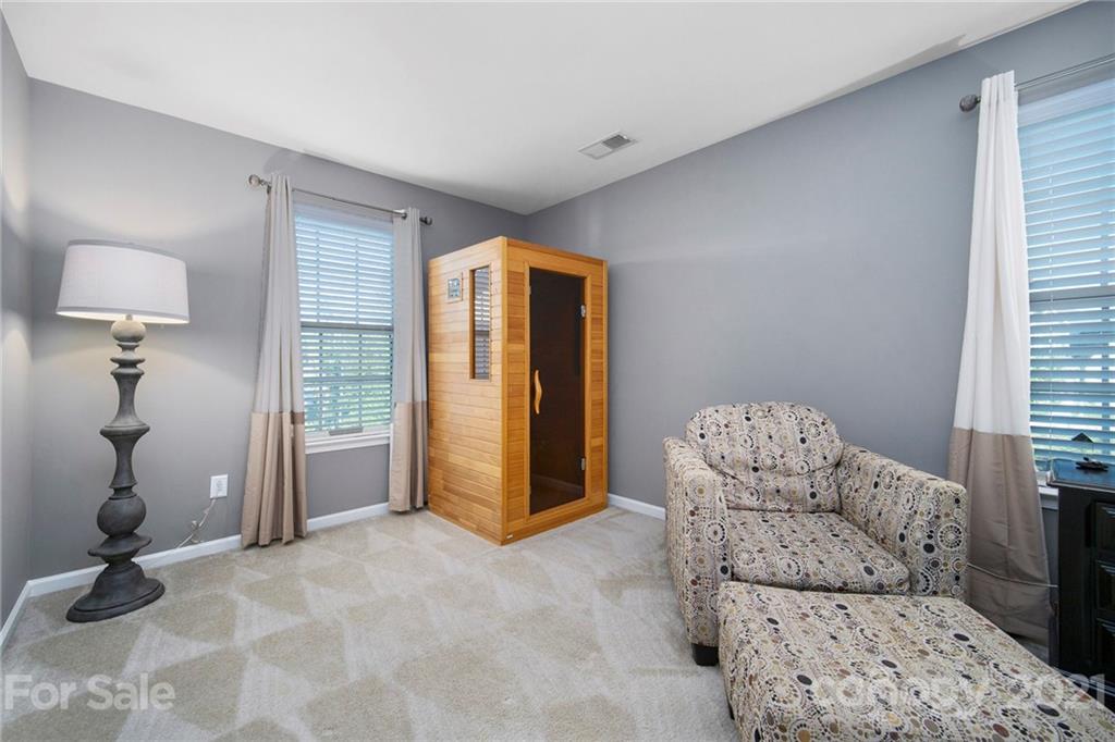2159 Stone Pile Drive Concord, NC 28025 - Photo 21 of 33 a living room with furniture a couch and a window