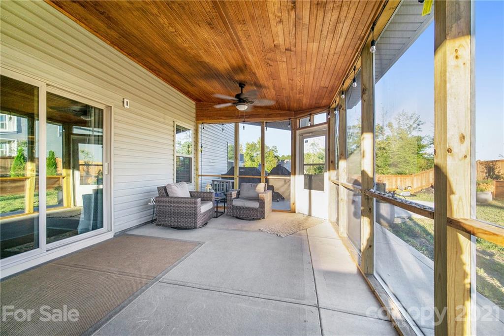 2159 Stone Pile Drive Concord, NC 28025 - Photo 29 of 33 a lobby with furniture and floor to ceiling window