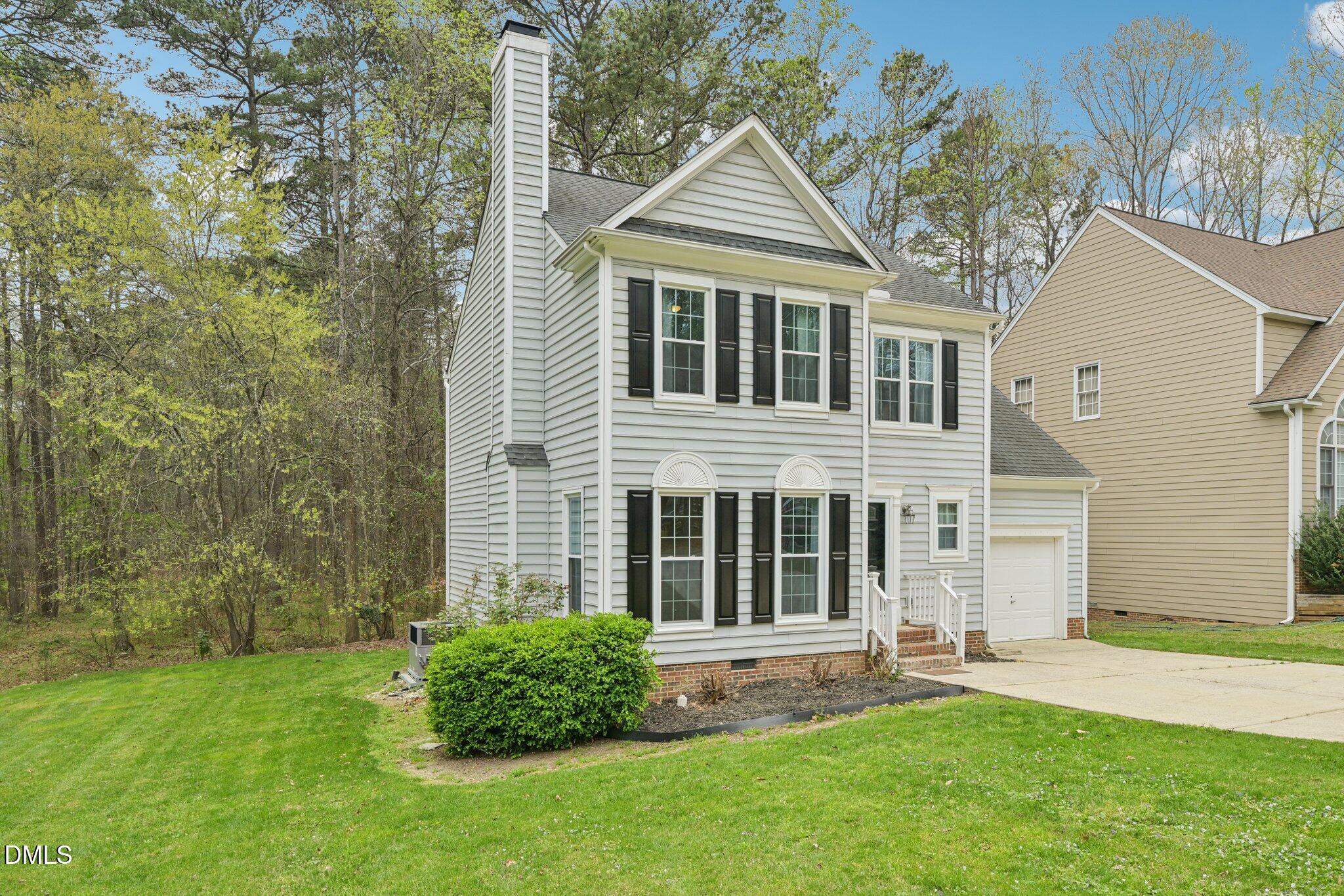 9305 Dominion Boulevard Raleigh, NC 27617 - Photo 2 of 23 3-web-or-mls-Dominion Blvd-S2503-003