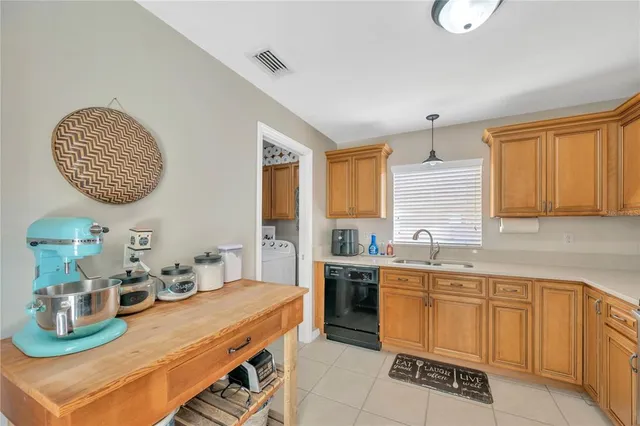 a kitchen with counter space cabinets and appliances