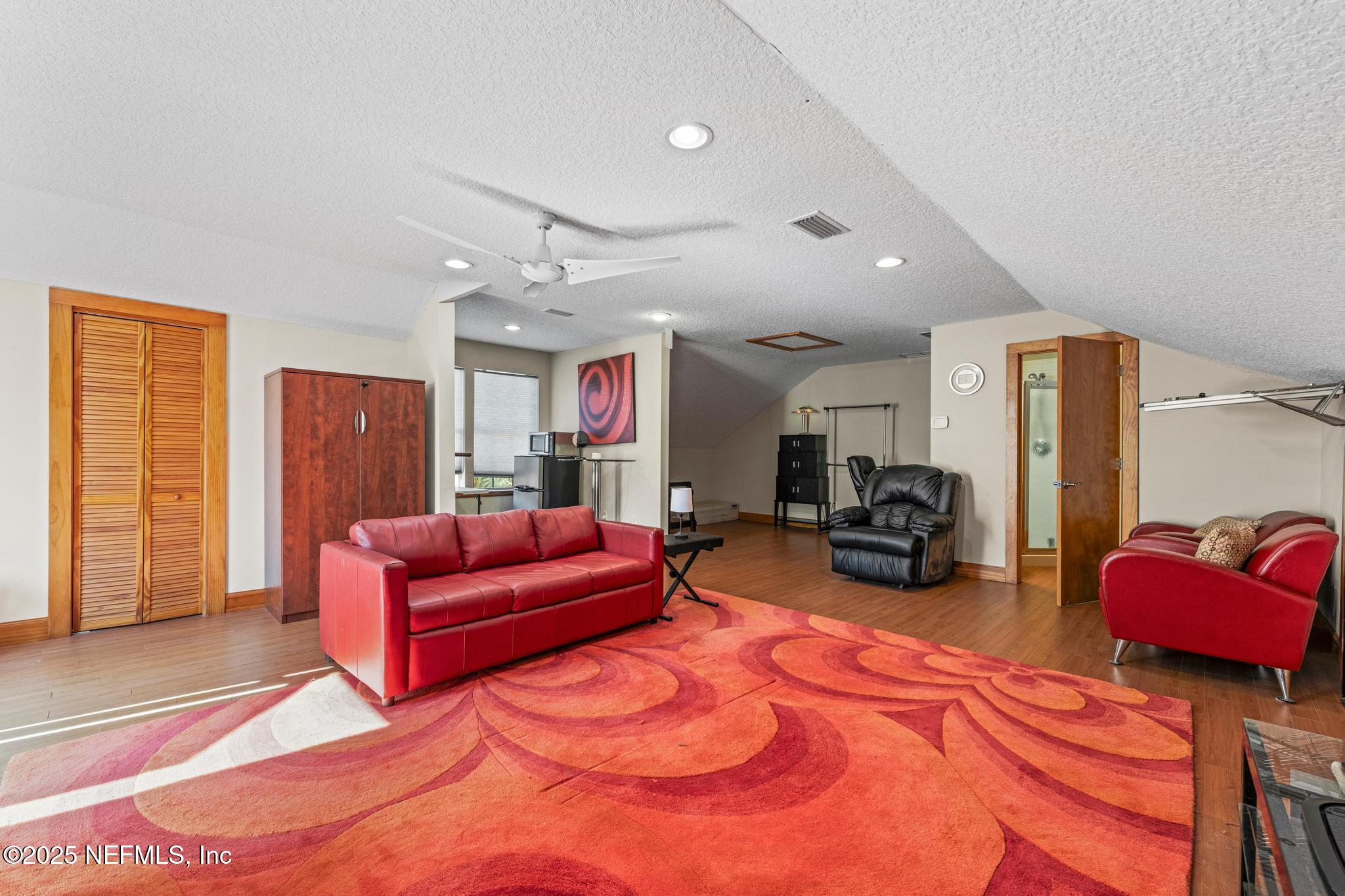 3010 Starratt Road Jacksonville, FL 32226 - Photo 102 of 106 a living room with furniture a couch and large window