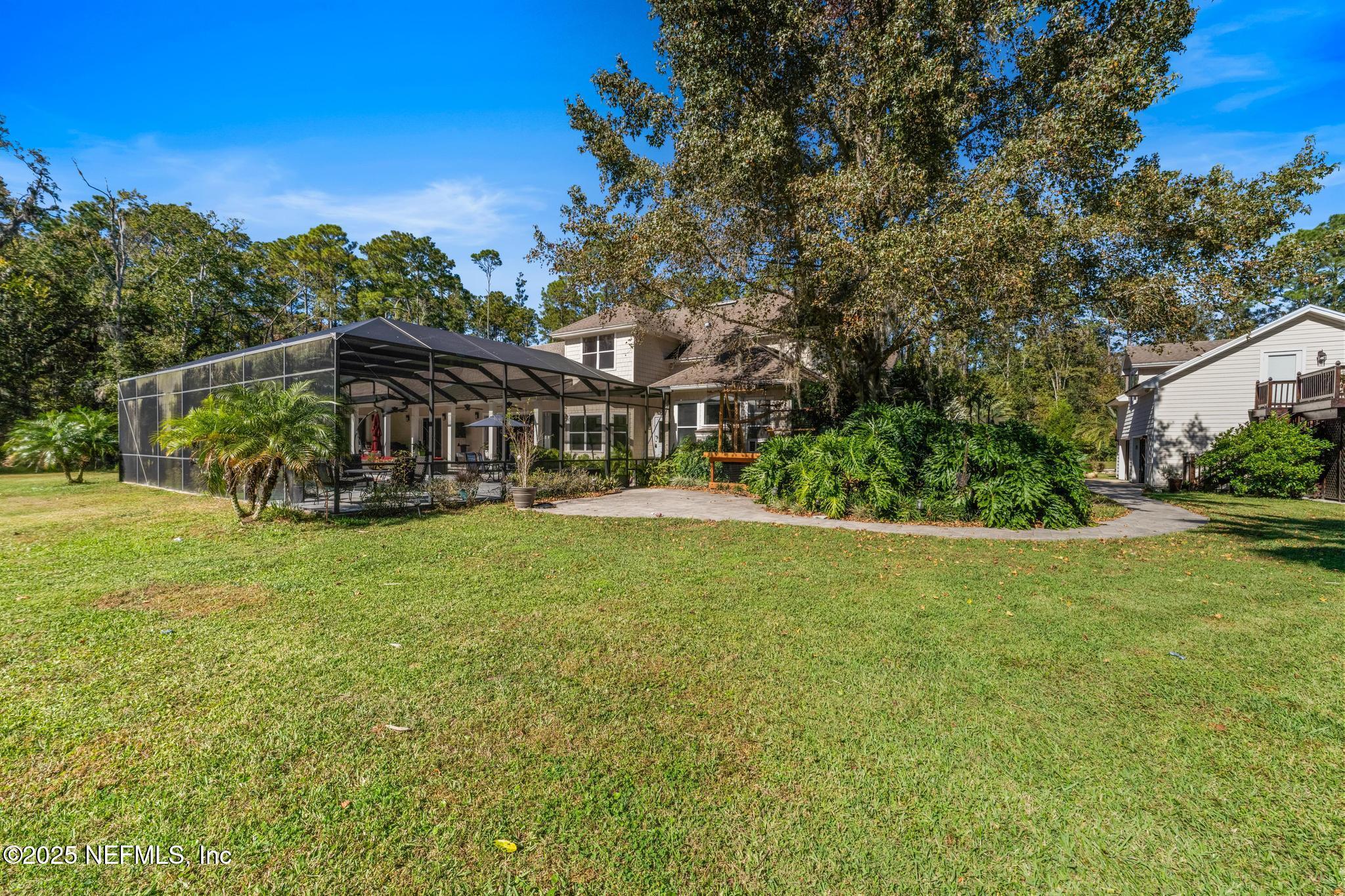 3010 Starratt Road Jacksonville, FL 32226 - Photo 103 of 106 a view of a house with a big yard