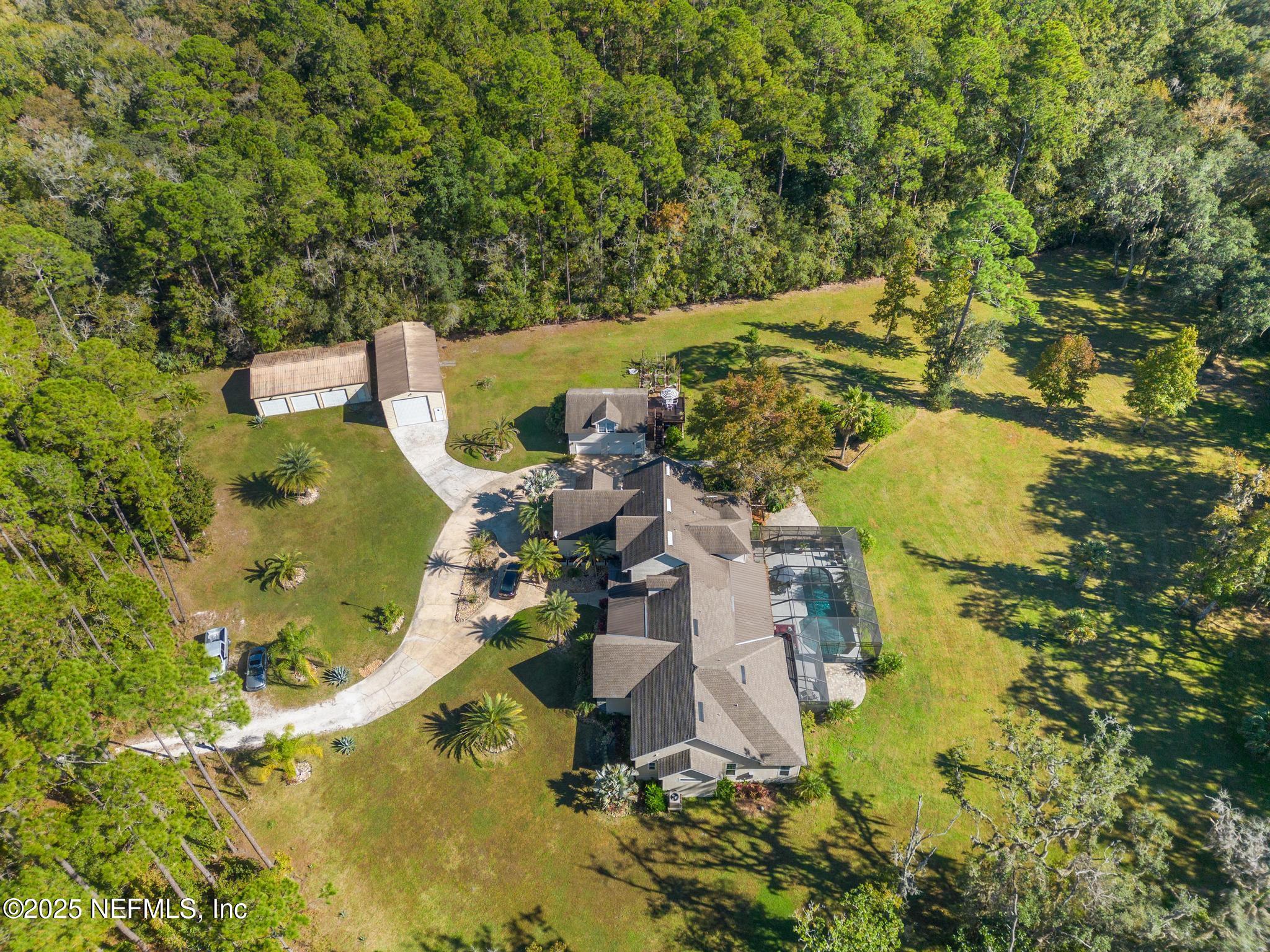 3010 Starratt Road Jacksonville, FL 32226 - Photo 13 of 106 an aerial view of a house with a swimming pool