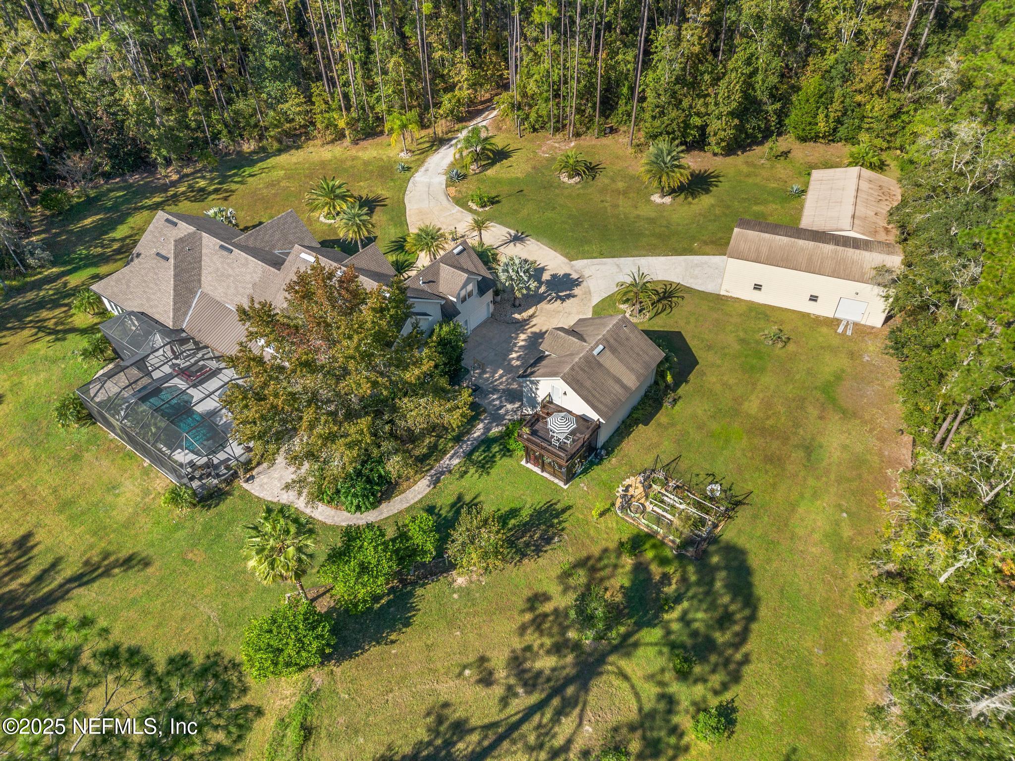 3010 Starratt Road Jacksonville, FL 32226 - Photo 17 of 106 an aerial view of residential houses with outdoor space