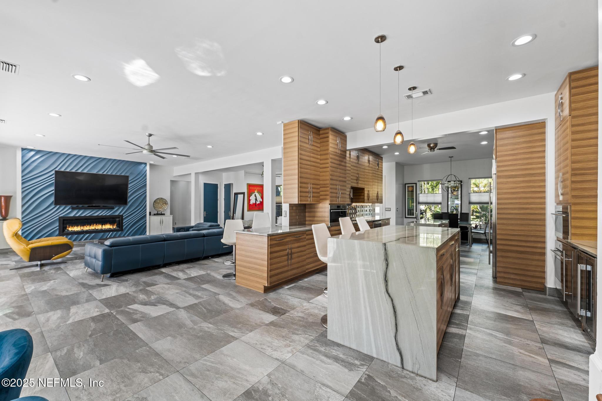 3010 Starratt Road Jacksonville, FL 32226 - Photo 21 of 106 a living room with furniture and a flat screen tv