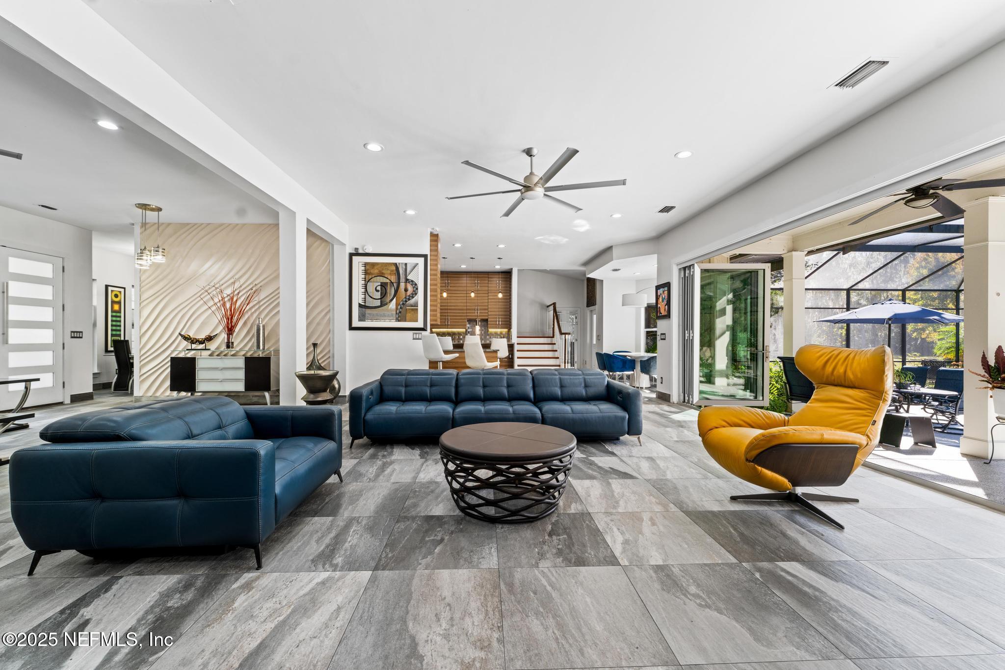 3010 Starratt Road Jacksonville, FL 32226 - Photo 24 of 106 a living room with furniture and a large window