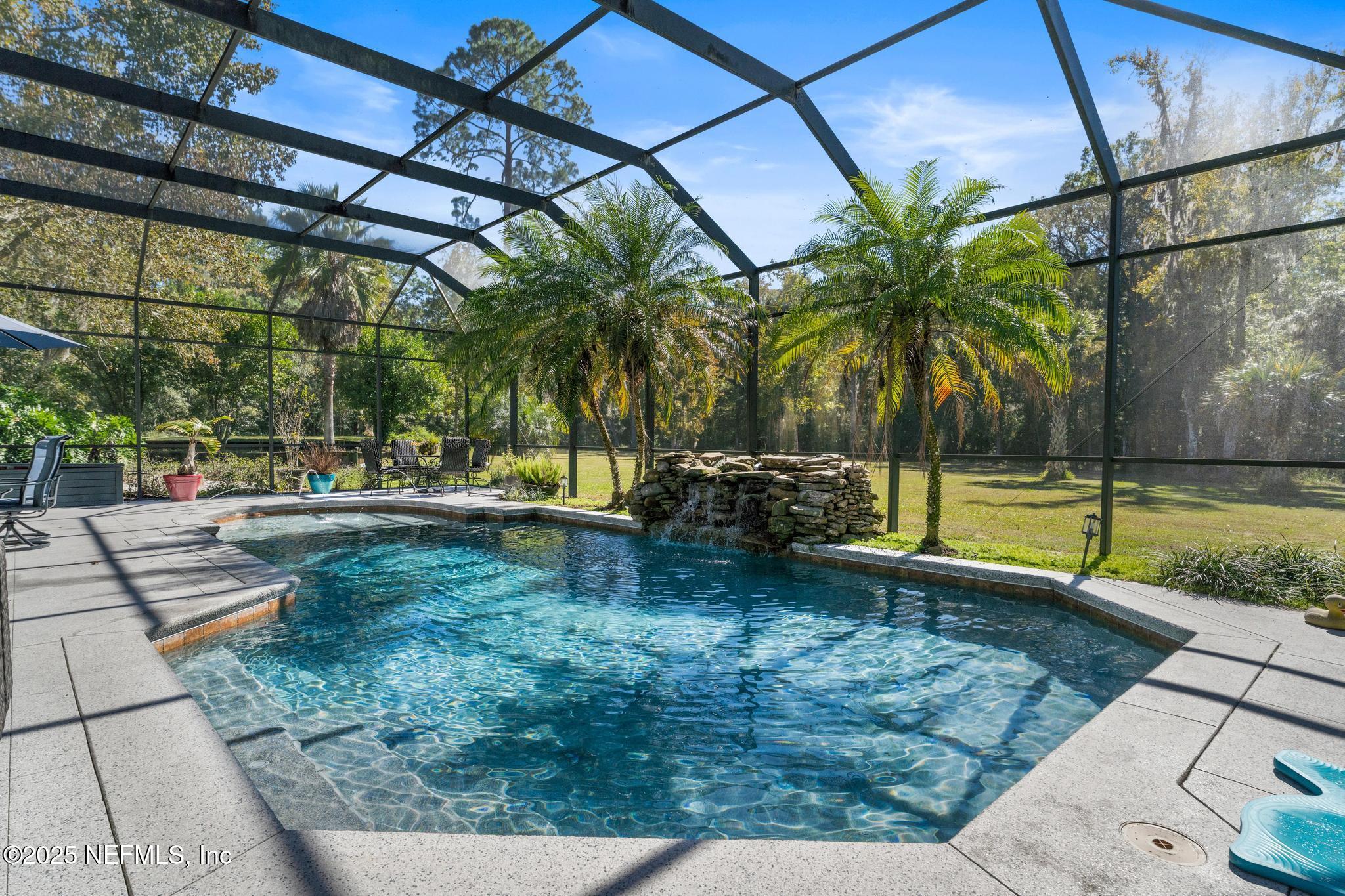 3010 Starratt Road Jacksonville, FL 32226 - Photo 76 of 106 a view of yard with swimming pool