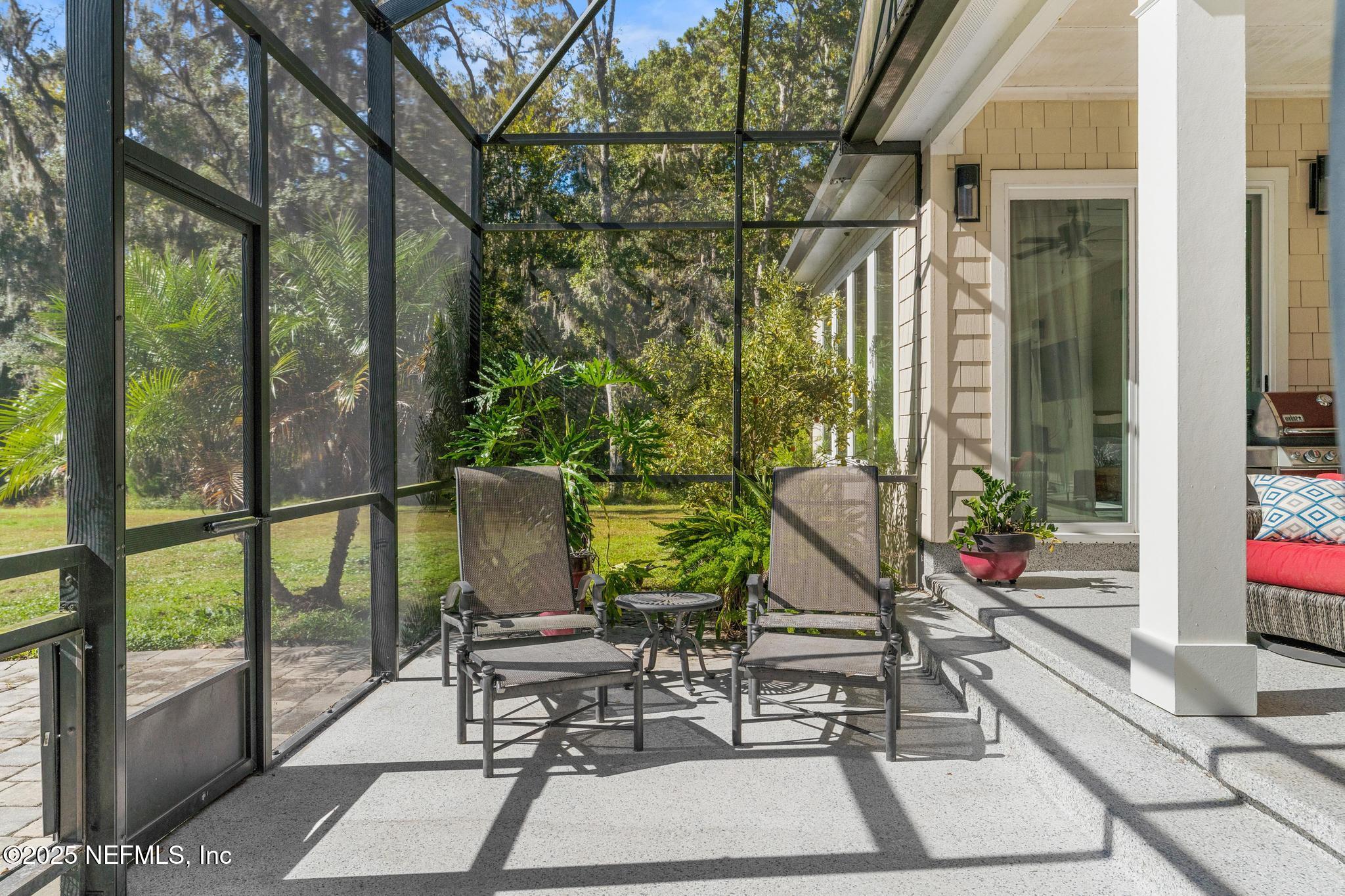 3010 Starratt Road Jacksonville, FL 32226 - Photo 80 of 106 a view of balcony with chairs and potted plants