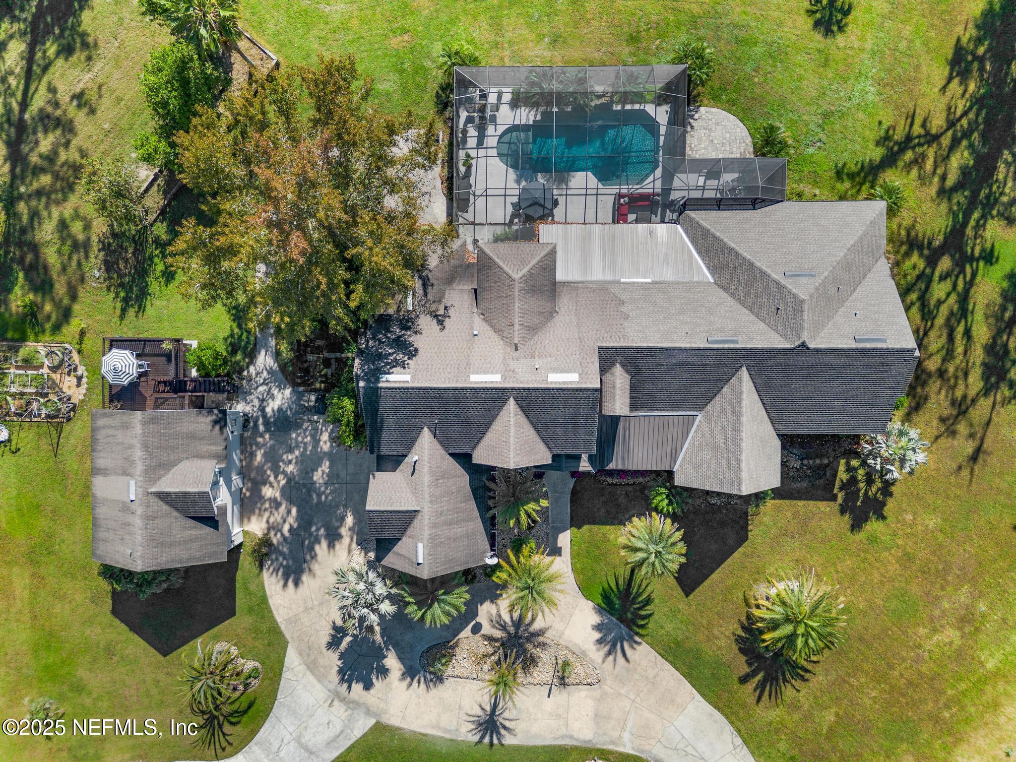 3010 Starratt Road Jacksonville, FL 32226 - Photo 8 of 106 an aerial view of a house with garden space and street view