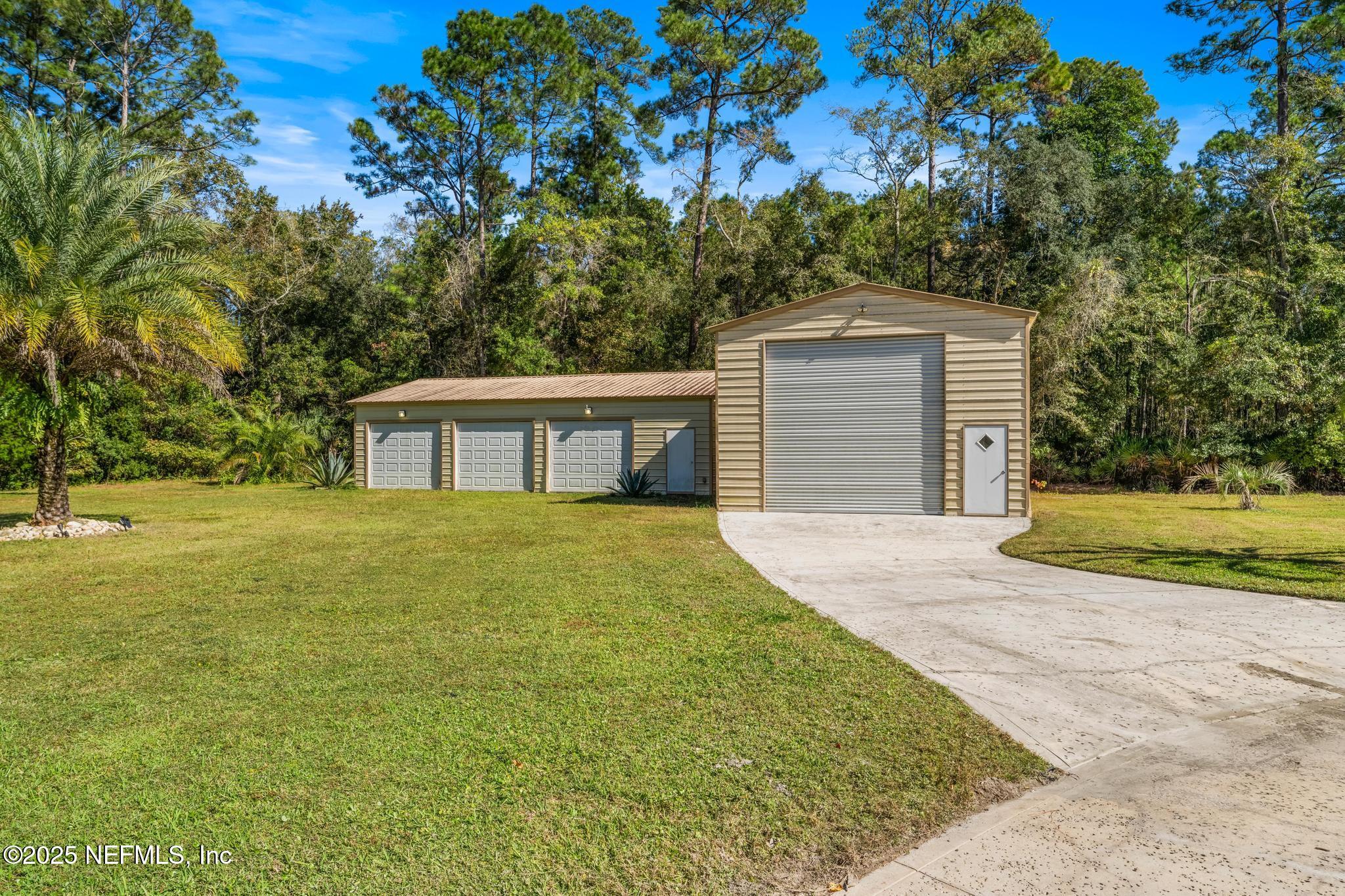 3010 Starratt Road Jacksonville, FL 32226 - Photo 87 of 106 a front view of a house with a garden