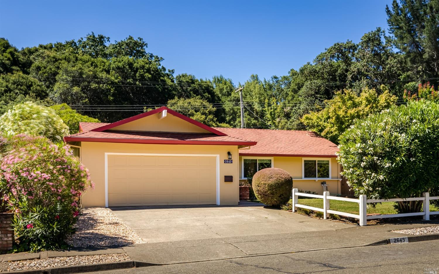2645 Center Road Novato, CA 94947 - Photo 1 of 1 a front view of a house with garden