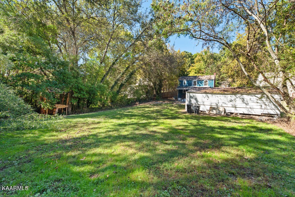 171 Garden Road Norris, TN 37828 - Photo 23 of 33 a view of a house with a yard