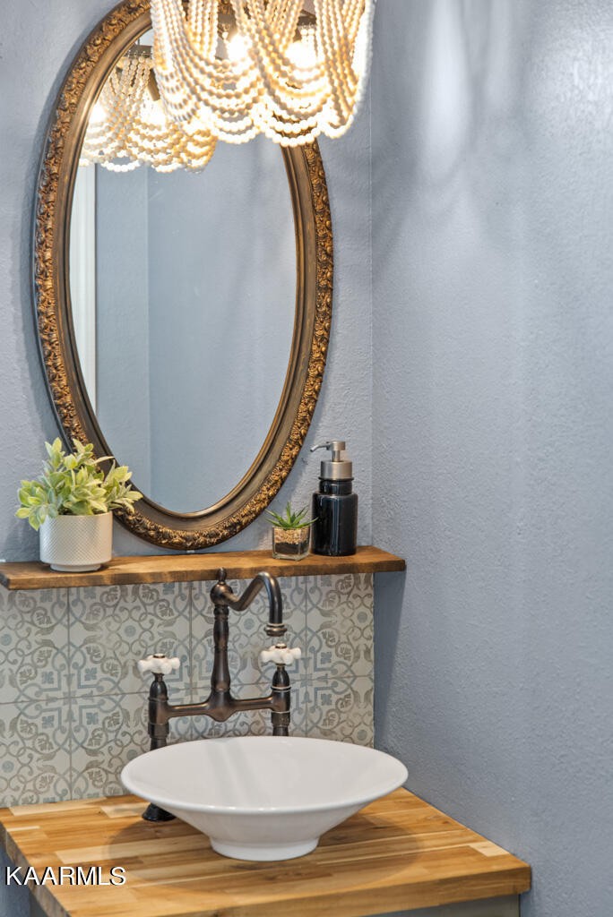 171 Garden Road Norris, TN 37828 - Photo 30 of 33 a bathroom with a sink and a mirror