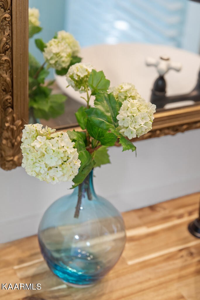 171 Garden Road Norris, TN 37828 - Photo 32 of 33 a vase of flowers sitting on a table