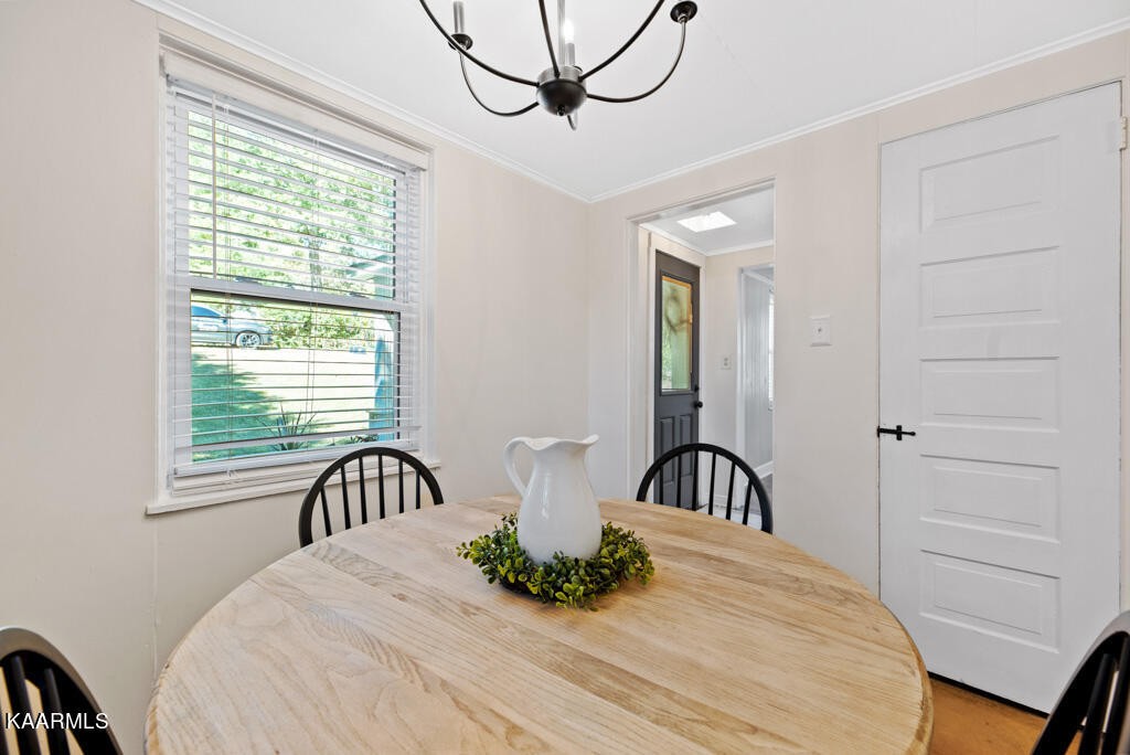 171 Garden Road Norris, TN 37828 - Photo 7 of 33 a bedroom with a bed and a large window