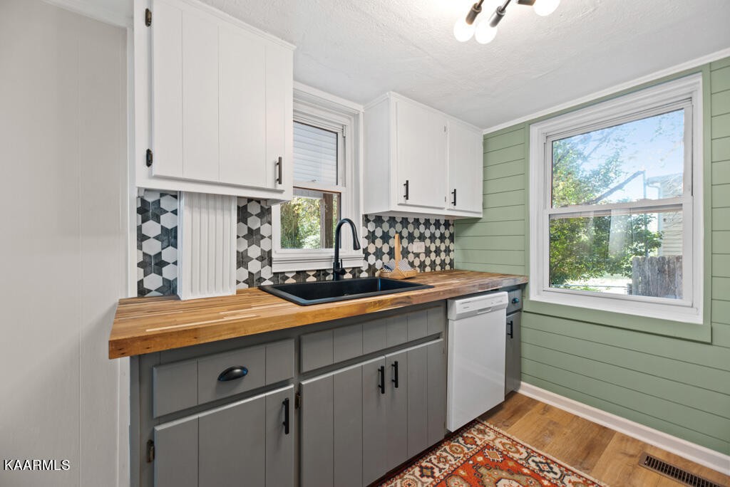 171 Garden Road Norris, TN 37828 - Photo 8 of 33 a view of cabinets a sink and a window in a room