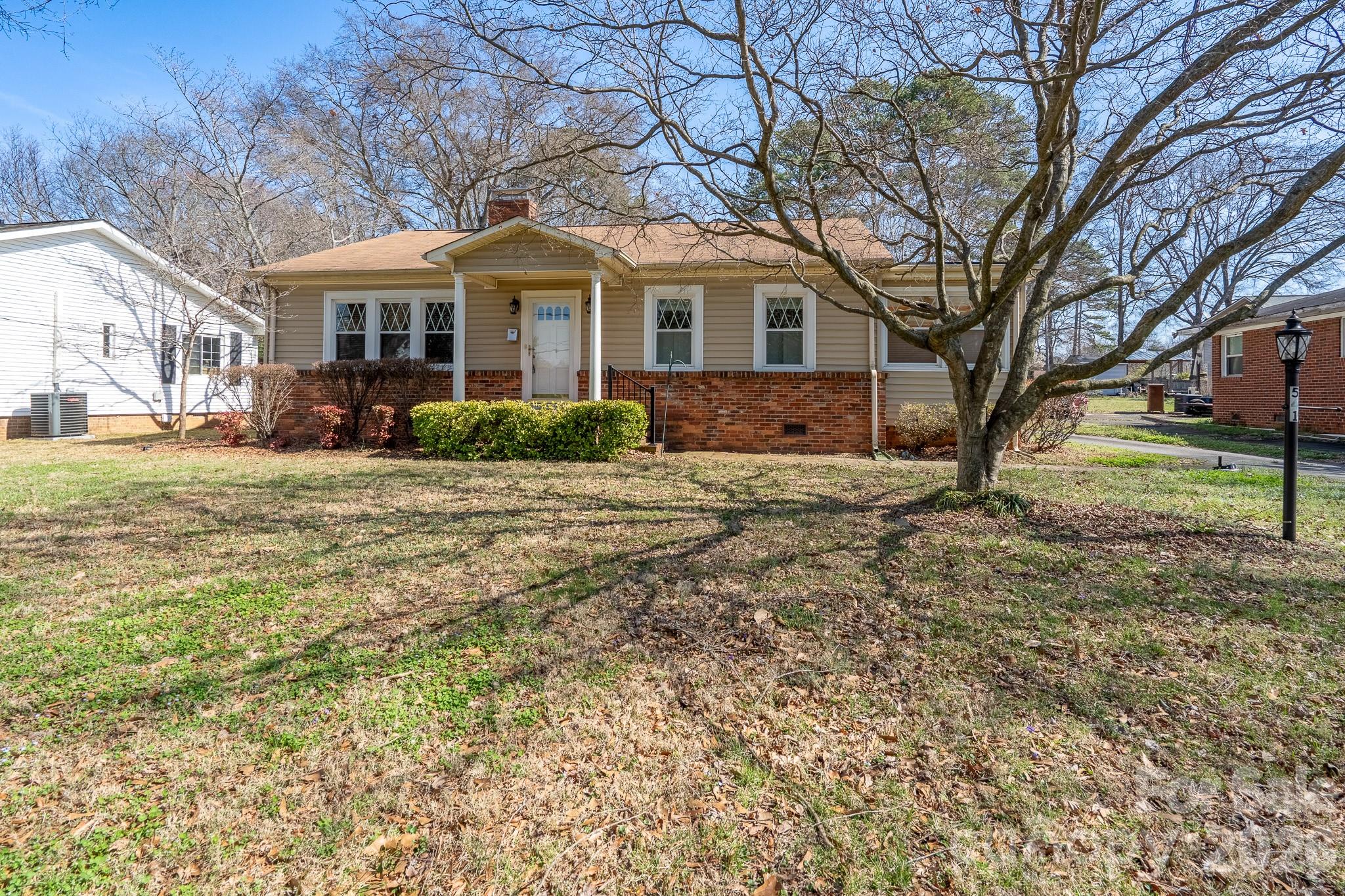 541 Union Street South Concord, NC 28025 - Photo 1 of 29 a front view of a house with a yard
