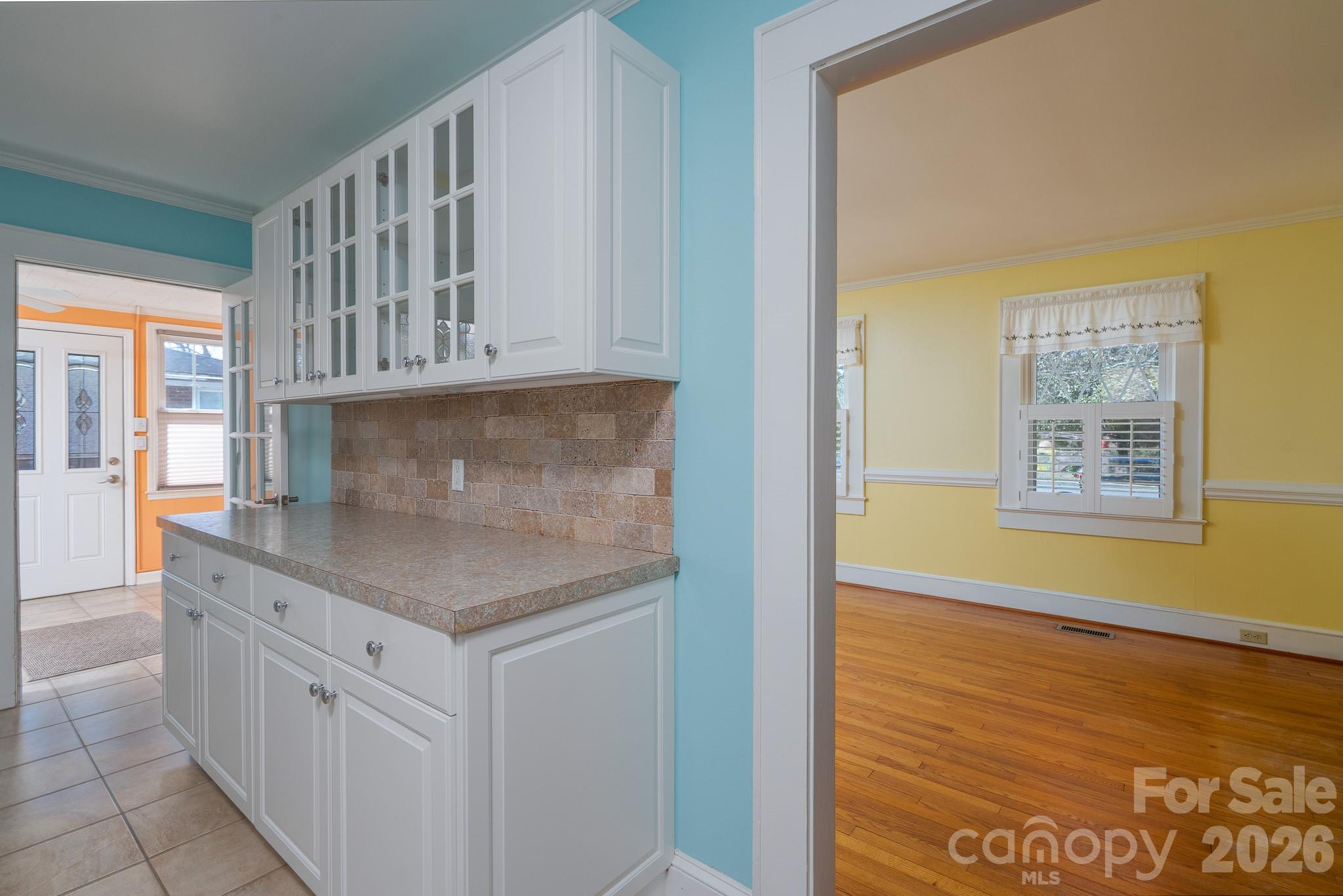 541 Union Street South Concord, NC 28025 - Photo 12 of 29 a kitchen with stainless steel appliances cabinets and wooden floor