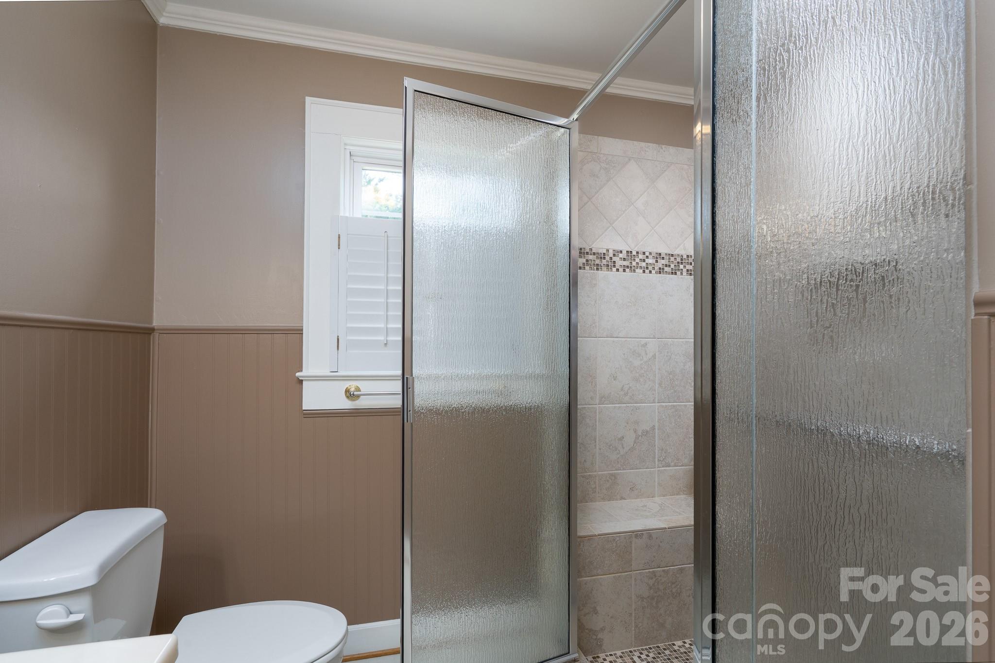 541 Union Street South Concord, NC 28025 - Photo 17 of 29 a bathroom with a shower and toilet