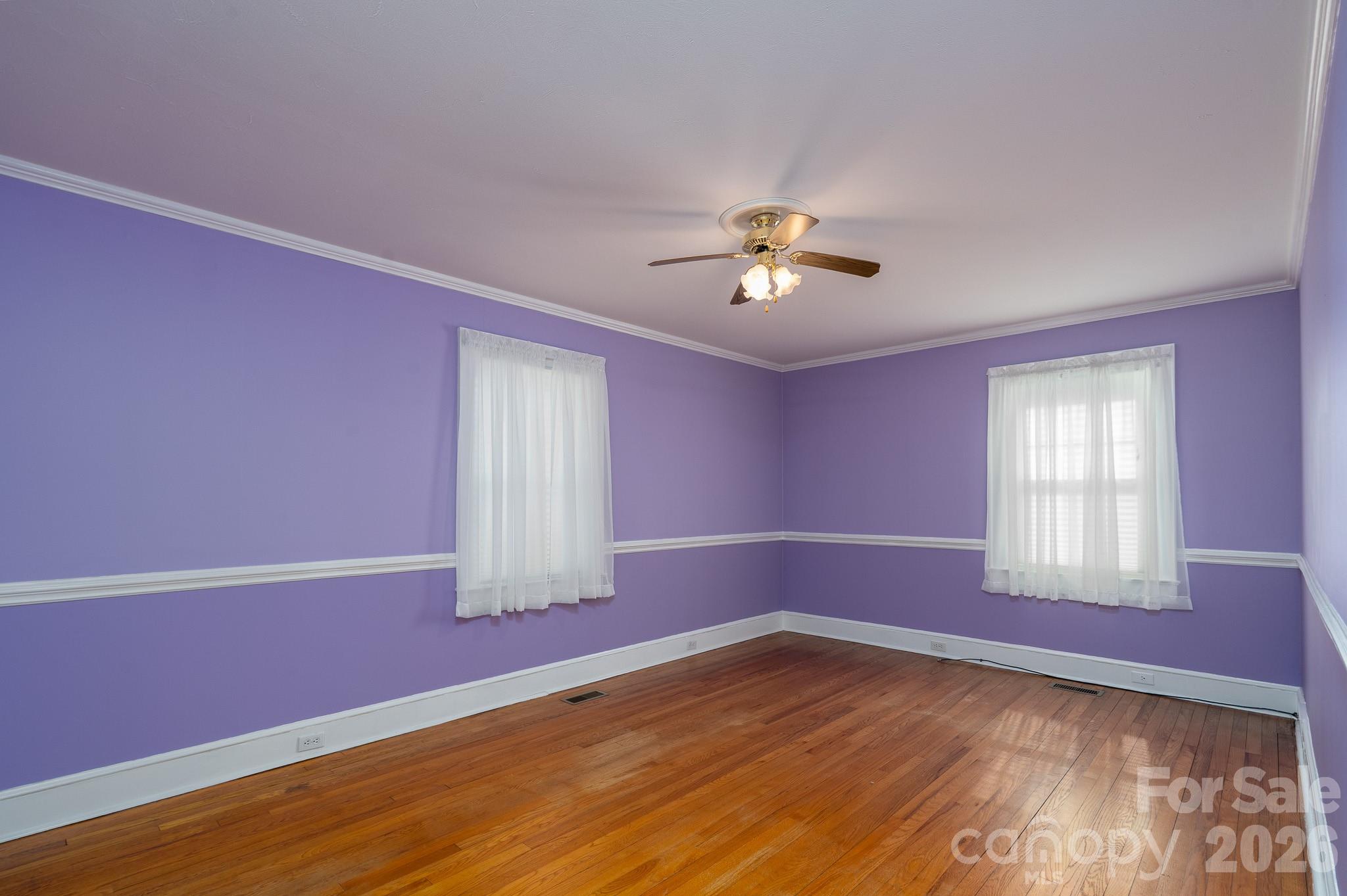 541 Union Street South Concord, NC 28025 - Photo 18 of 29 a view of empty room with window and ceiling fan