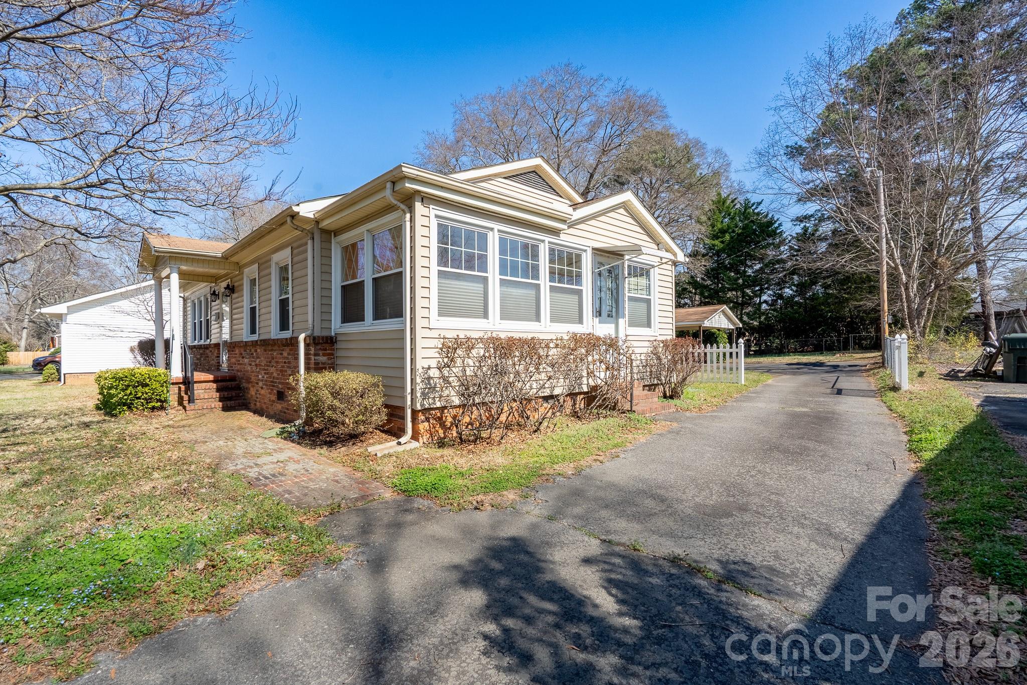 541 Union Street South Concord, NC 28025 - Photo 26 of 29 a front view of a house with a yard