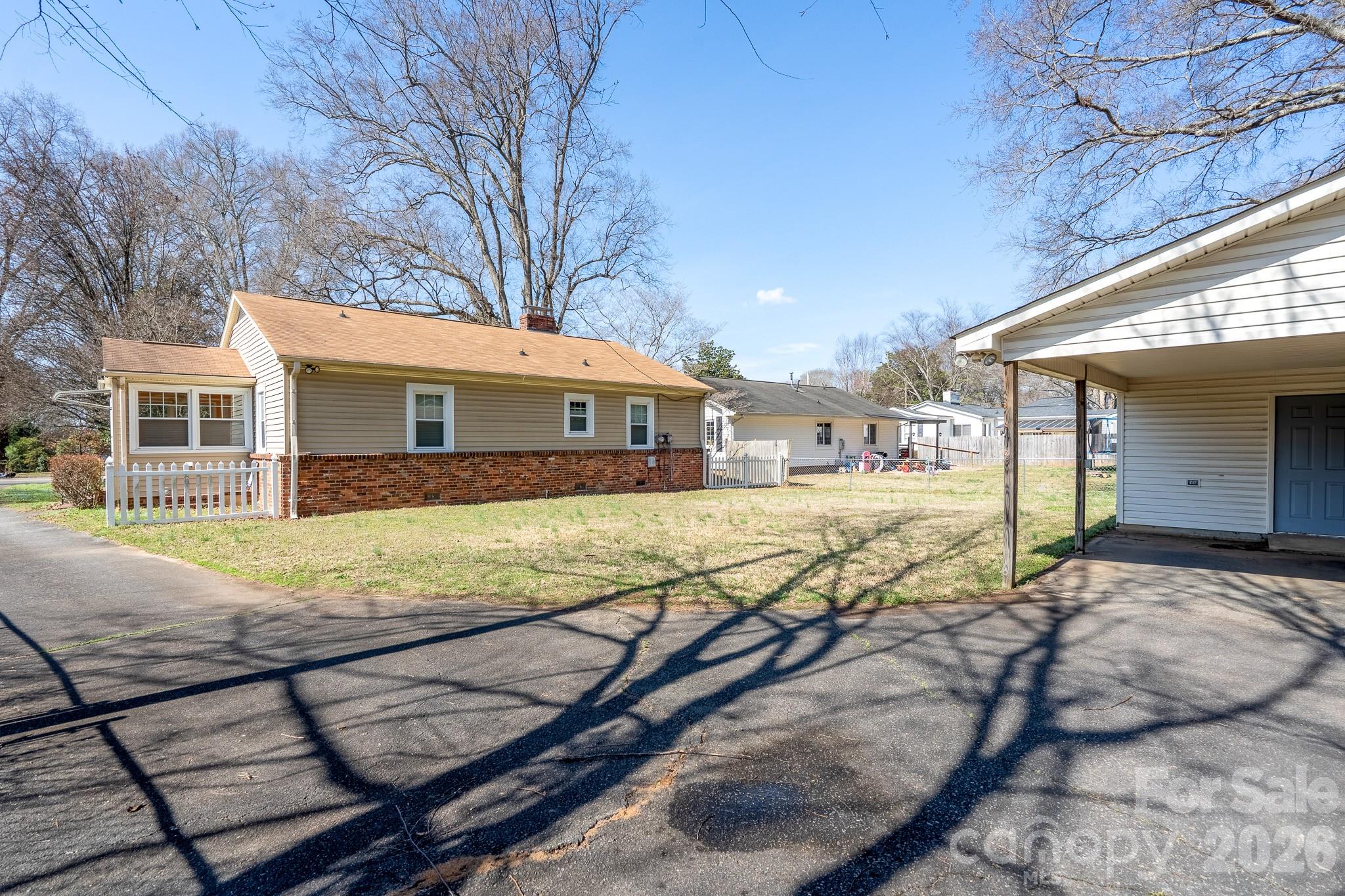 541 Union Street South Concord, NC 28025 - Photo 27 of 29 a view of house with outdoor seating