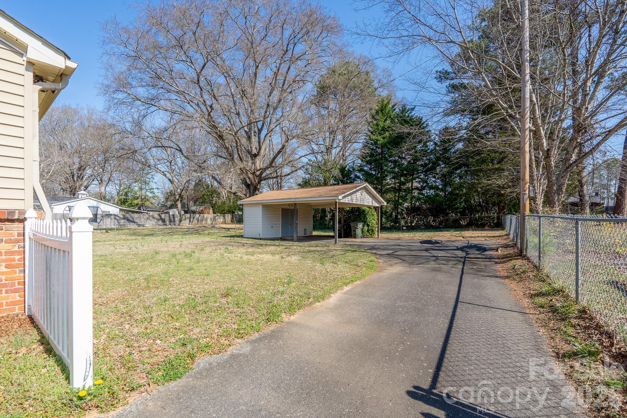 541 Union Street South Concord, NC 28025 - Photo 29 of 29 a view of a yard with wooden fence
