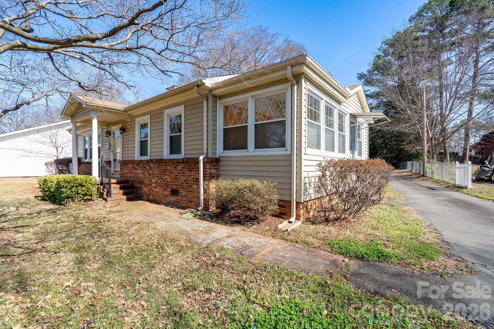 541 Union Street South Concord, NC 28025 - Photo 3 of 29 a front view of a house with a yard
