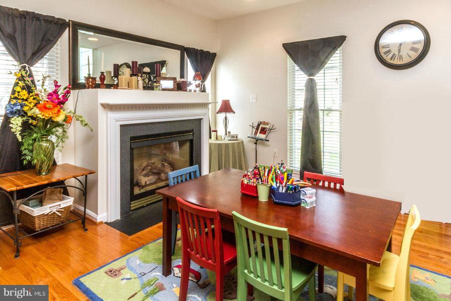 1216 Birchleaf Court Crofton, MD 21114 - Photo 13 of 30 Charming Dining Room with Gas Fireplace