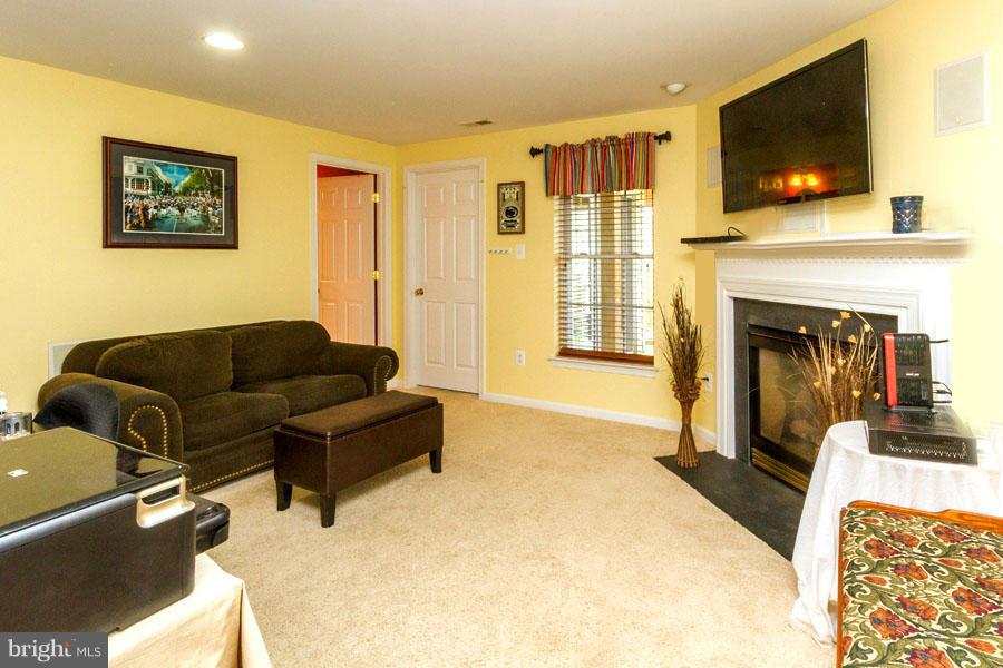 1216 Birchleaf Court Crofton, MD 21114 - Photo 9 of 30 Main Level Family Room with Gas Fireplace